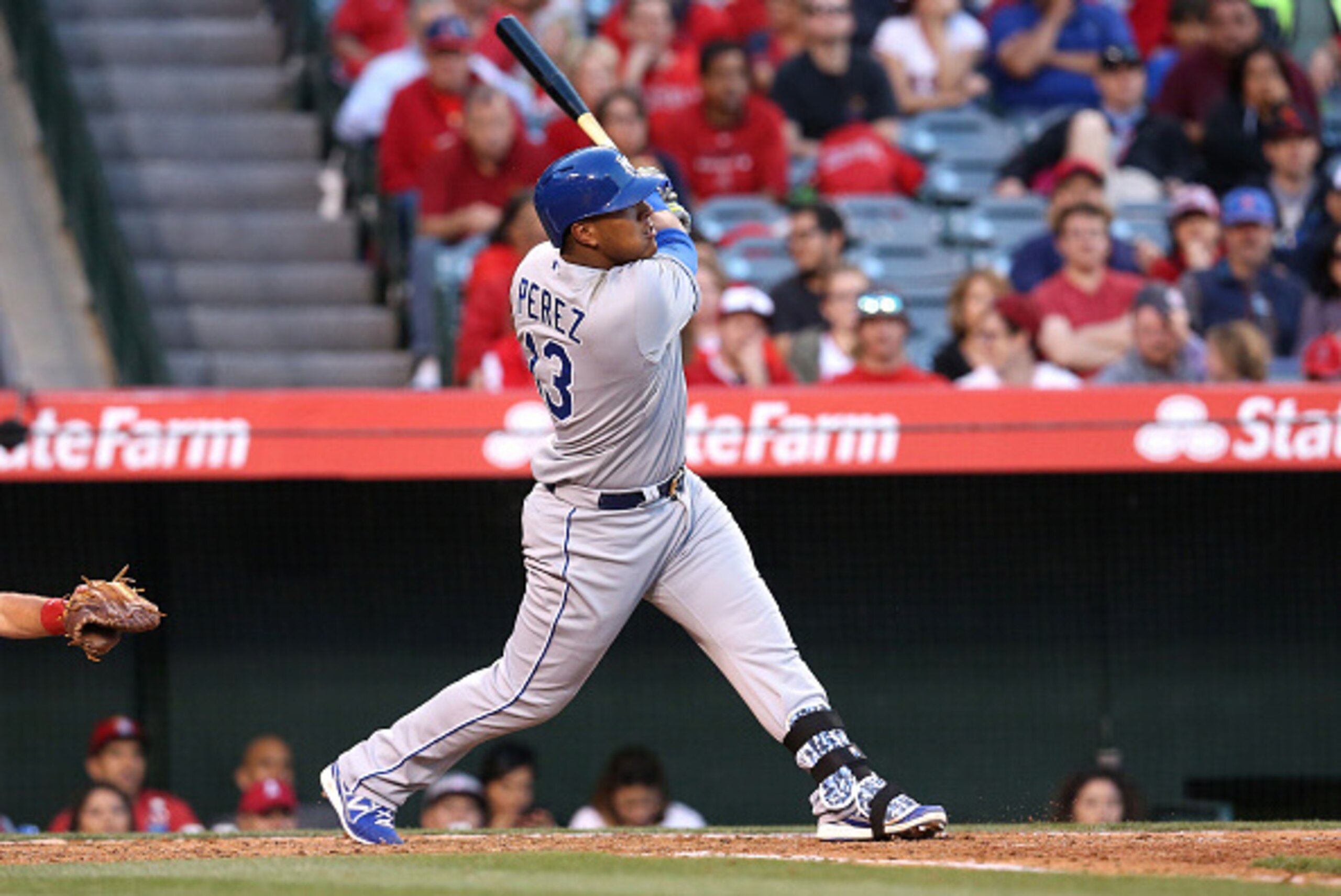 ANAHEIM, CA - APRIL 11:  Salvador Perez #13 and Alez Rios #15 of the Kansas City Royals hits a' two run home run in the fourth inning against the Los Angeles Angels of Anaheim at Angel Stadium of Anaheim on April 11, 2015 in Anaheim, California.  (Photo b