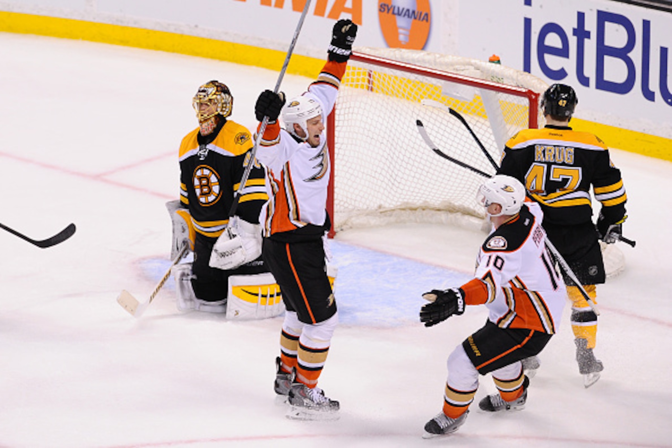 BOSTON, MA - MARCH 26: Ryan Getzlaf #15 and Corey Perry #10 of the Anaheim Ducks celebrate an overtime goal against the Boston Bruins at the TD Garden on March 28, 2015 in Boston, Massachusetts.  (Photo by Steve Babineau/NHLI via Getty Images)