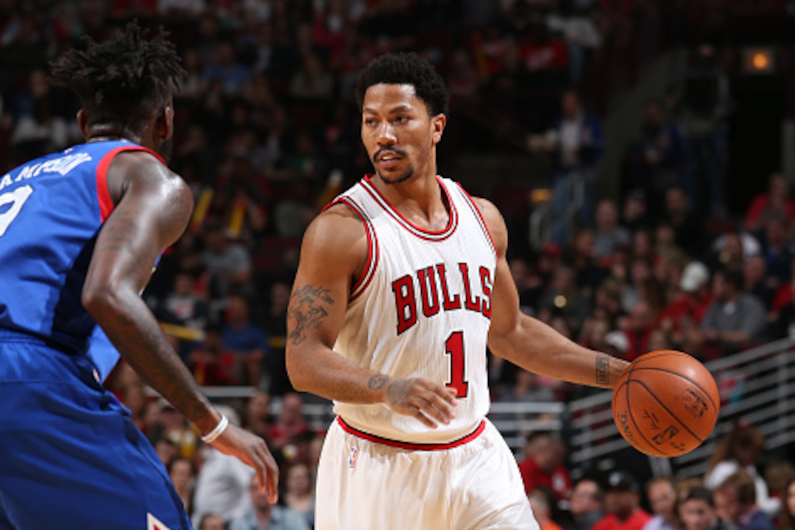CHICAGO, IL - APRIL 11:  Derrick Rose #1 of the Chicago Bulls handles the ball against the Philadelphia 76ers on April 11, 2015 at the United Center in Chicago, Illinois. NOTE TO USER: User expressly acknowledges and agrees that, by downloading and or usi