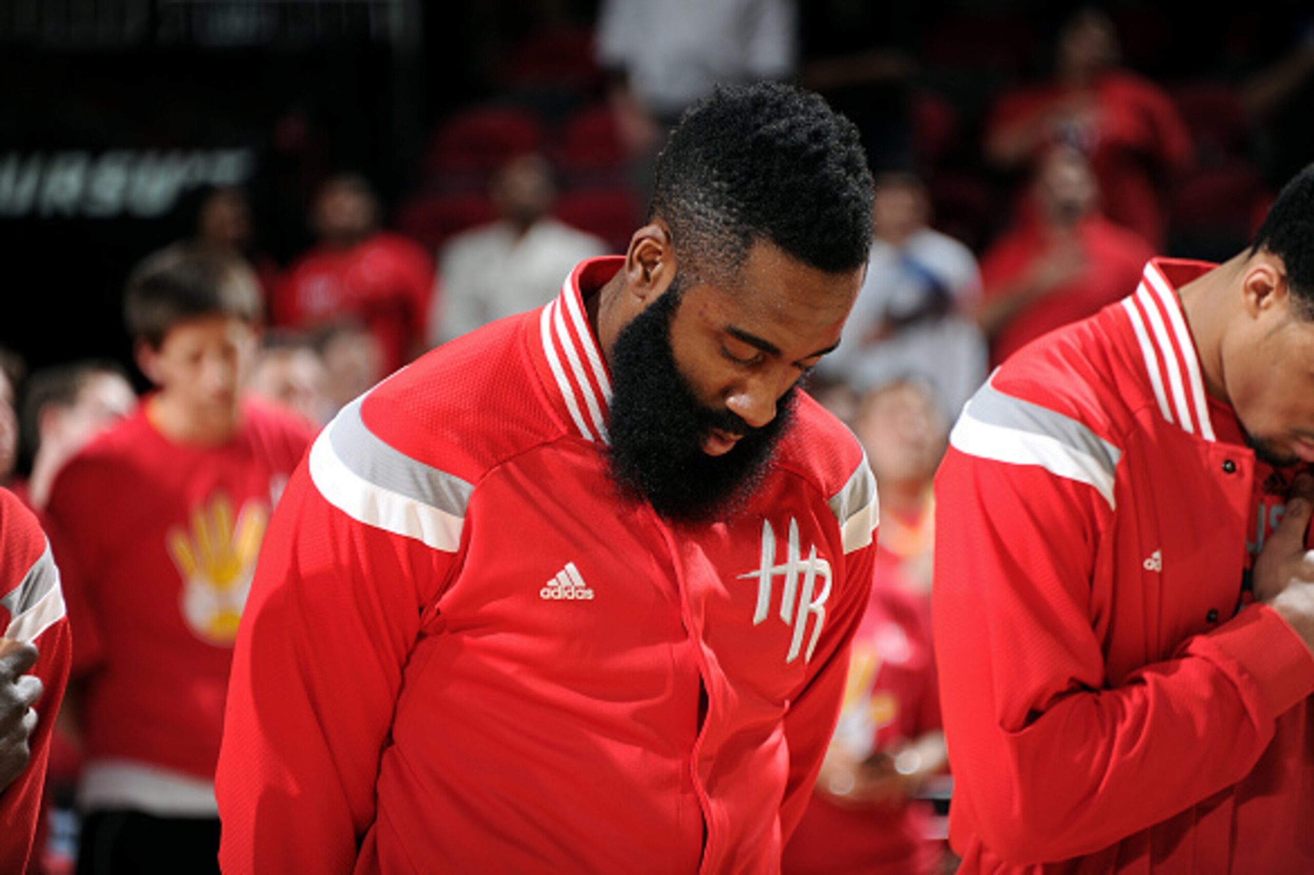 HOUSTON, TX - APRIL 10: James Harden #13 of the Houston Rockets stands for the national anthem before a game against the San Antonio Spurs on April 10, 2015 at the Toyota Center in Houston, Texas. NOTE TO USER: User expressly acknowledges and agrees that, HOUSTON, TX - APRIL 10: James Harden #13 of the Houston Rockets stands for the national anthem before a game against the San Antonio Spurs on April 10, 2015 at the Toyota Center in Houston, Texas. NOTE TO USER: User expressly acknowledges and agrees that,