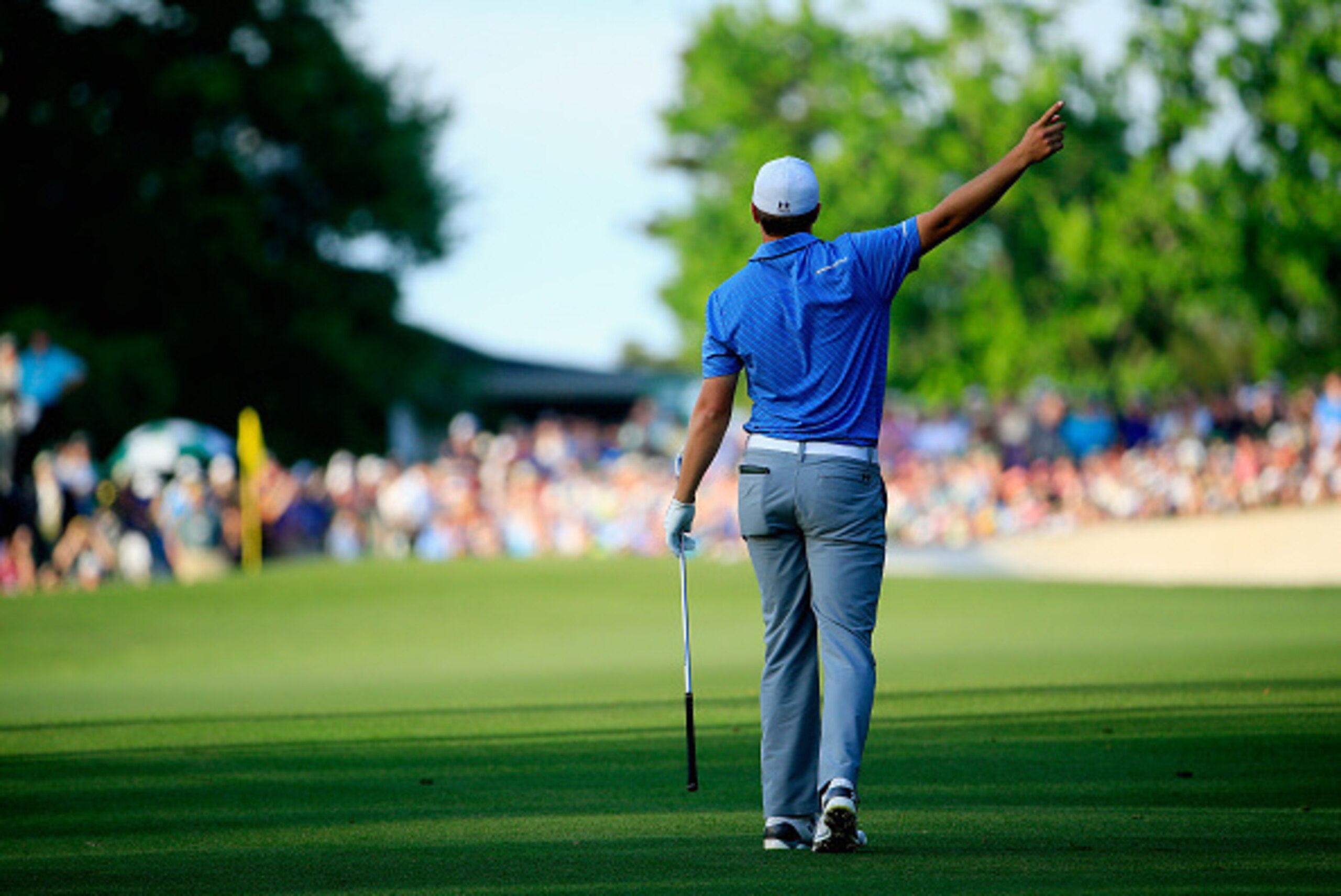 AUGUSTA, GA - APRIL 11:  Jordan Spieth of the United States reacts to a shot on the 18th hole during the third round of the 2015 Masters Tournament at Augusta National Golf Club on April 11, 2015 in Augusta, Georgia.  (Photo by Jamie Squire/Getty Images)