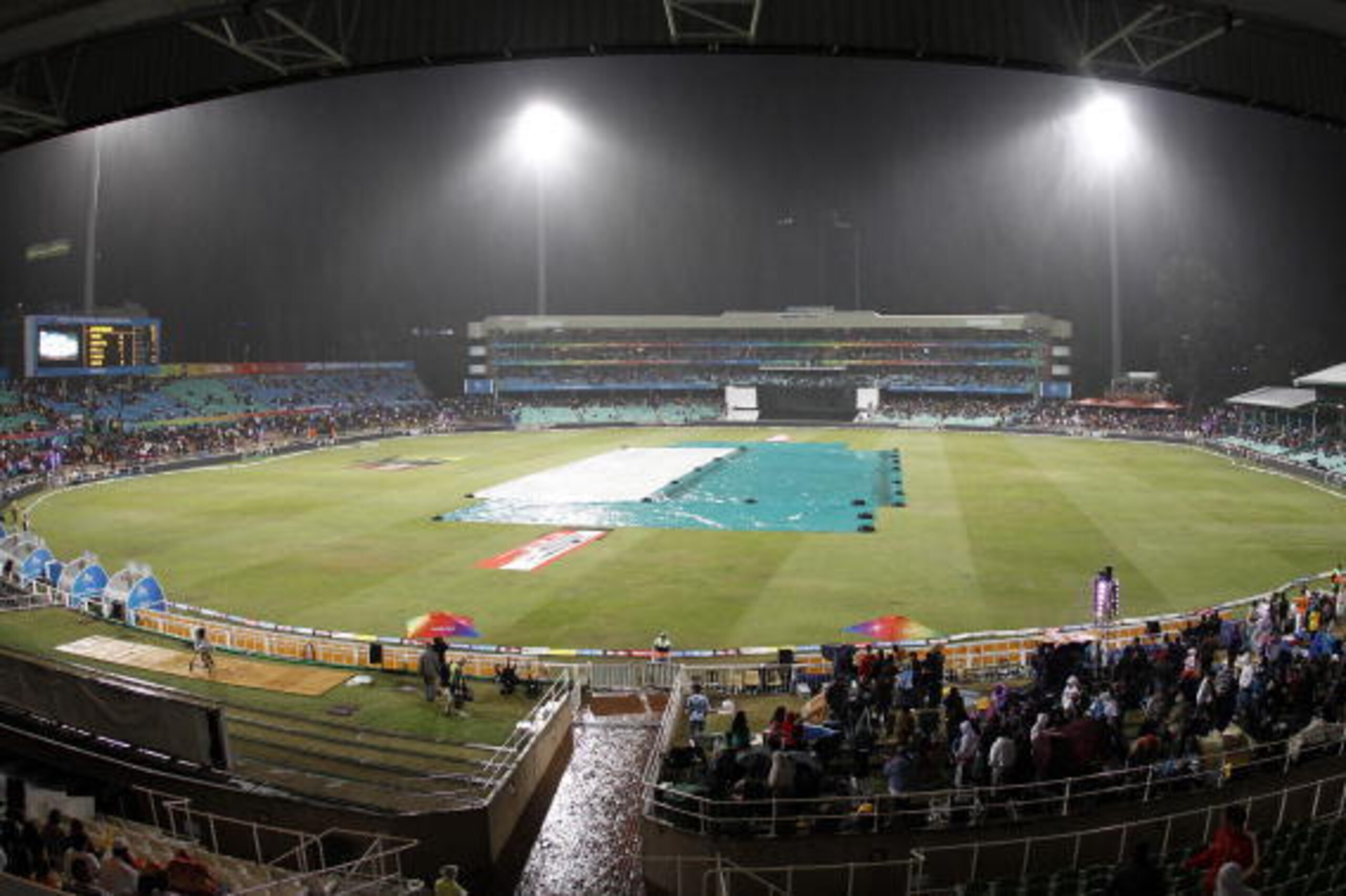 DURBAN, SOUTH AFRICA - SEPTEMBER 24:   Rain puts a stop to play during the 3rd over during the Airtel Champions League Twenty20 semi final match between Chennai Super Kings and Royal Challengers Bangalore at Sahara Stadium Kingsmead on September 24, 2010 