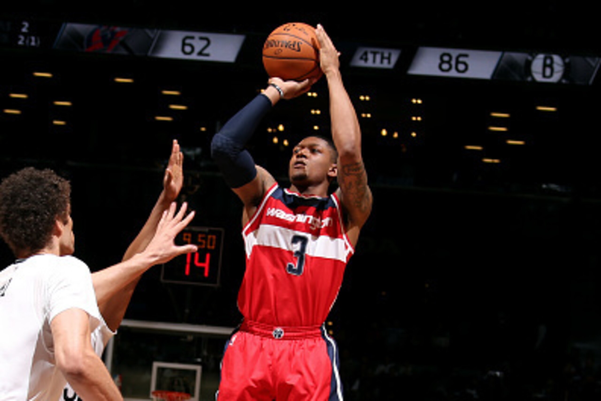 NEW YORK, NY - APRIL 10: Bradley Beal #3 of the Washington Wizards shoots against the Brooklyn Nets on April 10, 2015 at the Barclays Center in the Brooklyn borough of New York City. NOTE TO USER: User expressly acknowledges and agrees that, by downloadin