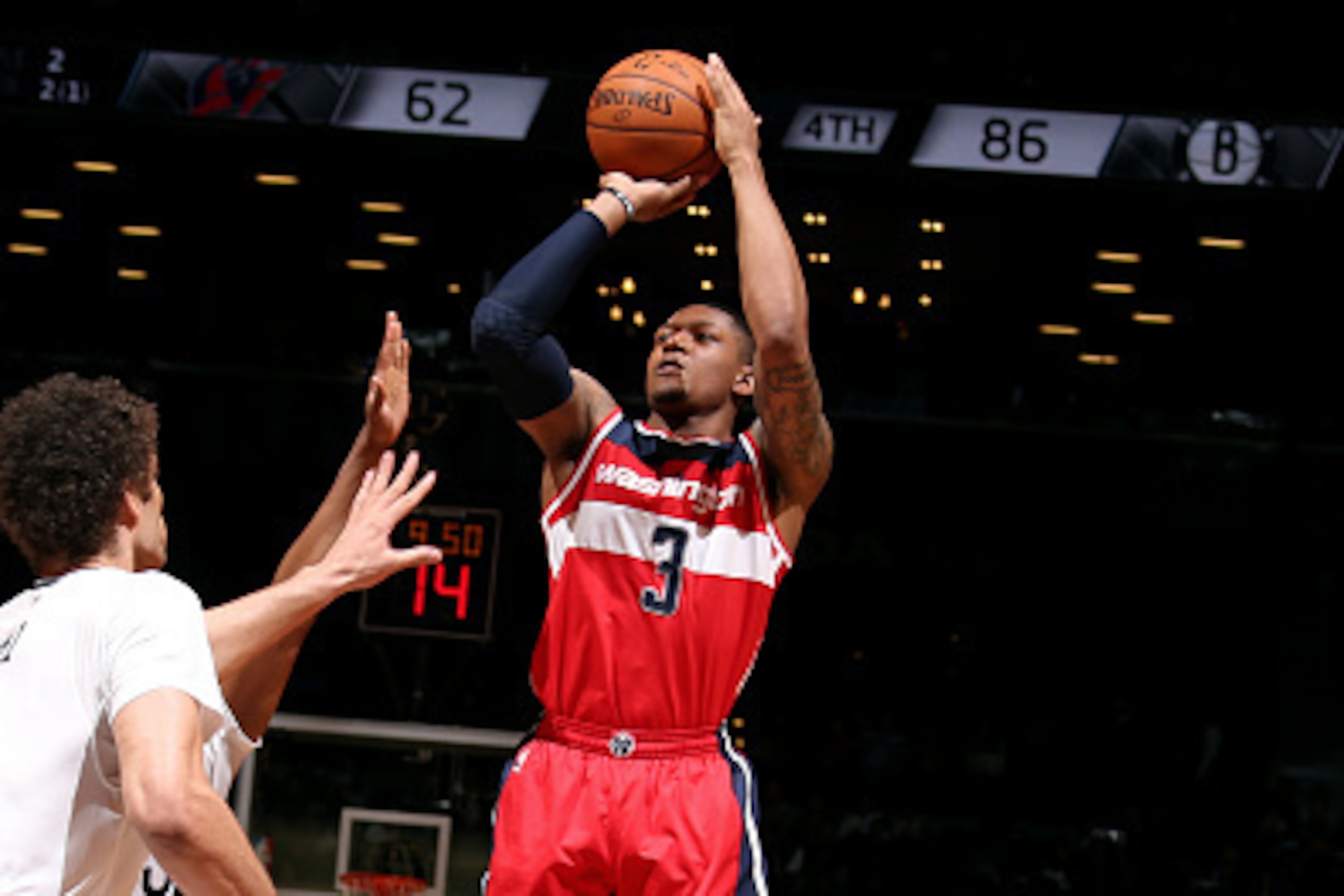 NEW YORK, NY - APRIL 10: Bradley Beal #3 of the Washington Wizards shoots against the Brooklyn Nets on April 10, 2015 at the Barclays Center in the Brooklyn borough of New York City. NOTE TO USER: User expressly acknowledges and agrees that, by downloadin
