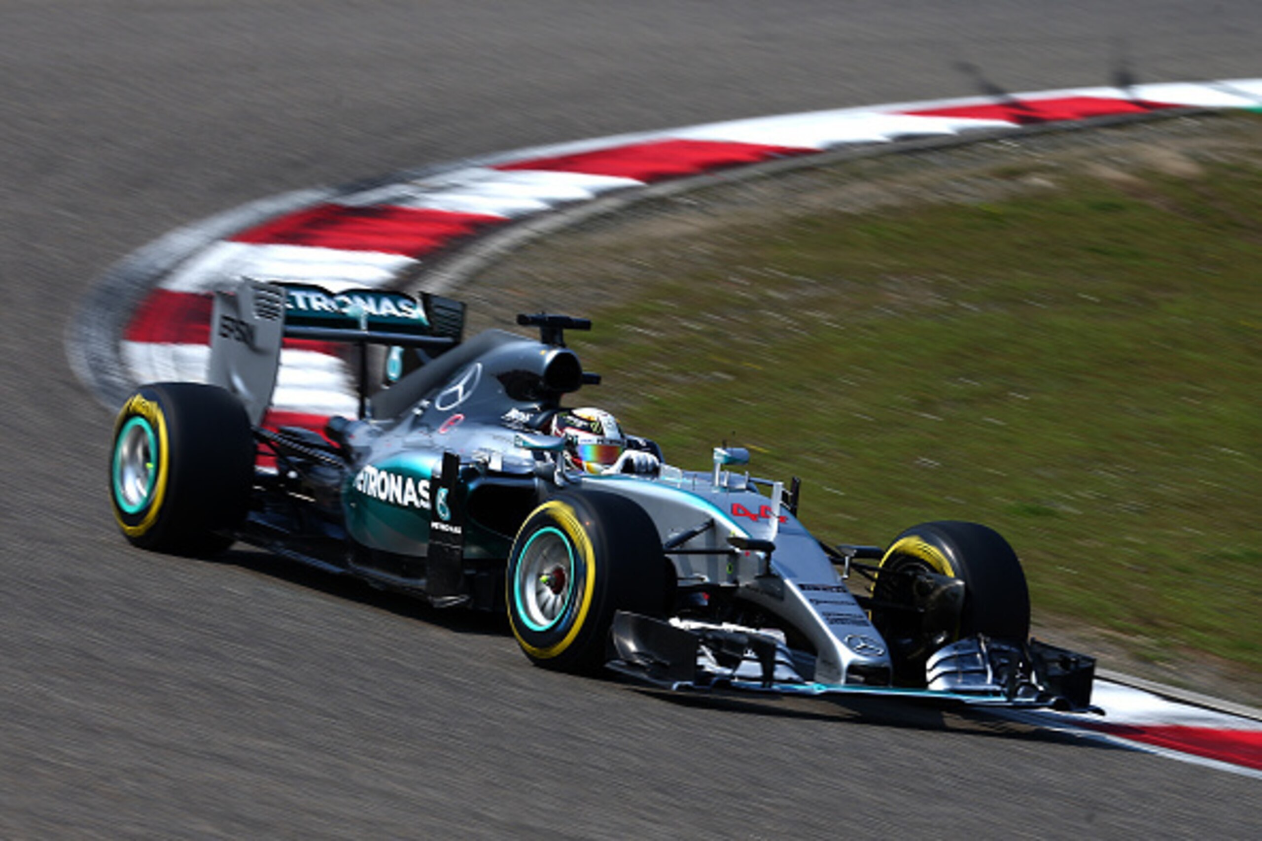 SHANGHAI, CHINA - APRIL 12:  Lewis Hamilton of Great Britain and Mercedes GP drives during the Formula One Grand Prix of China at Shanghai International Circuit on April 12, 2015 in Shanghai, China.  (Photo by Dan Istitene/Getty Images)