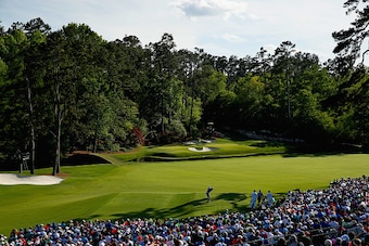 AUGUSTA, GA - APRIL 11: Jordan Spieth of the United States hits his tee shot on the 12th hole as Charley Hoffman of the United States looks on during the third round of the 2015 Masters Tournament at Augusta National Golf Club on April 11, 2015 in Augusta