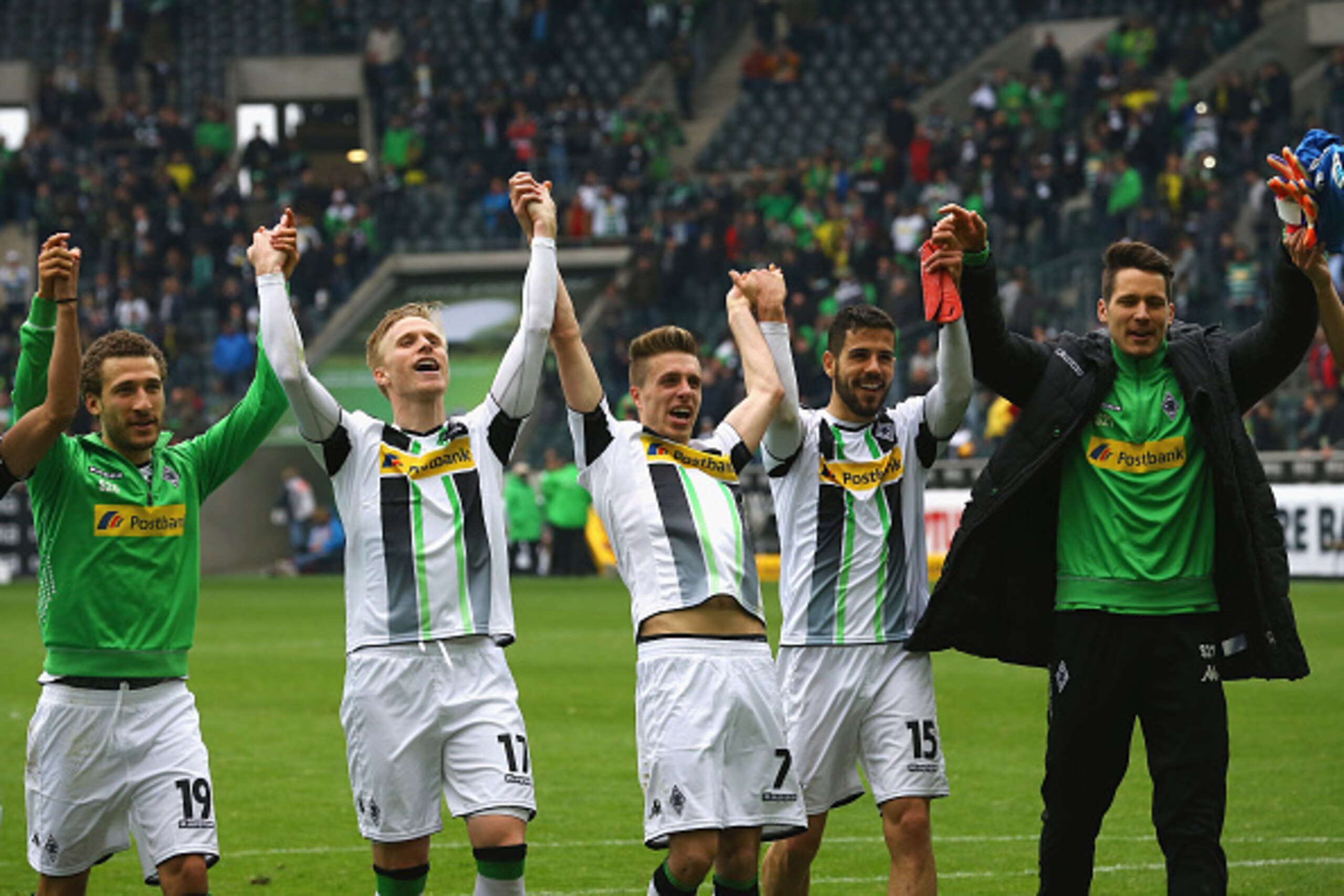 MOENCHENGLADBACH, GERMANY - APRIL 11:  (L-R) Fabian Johnson, Oscar Wendt, Patrick Herrmann,Alvaro Dominguez and Janis Blaswich of Moenchengladbach celebrate after the Bundesliga match between Borussia Moenchenglkadbach and Borussia Dortmund at Borussia Pa
