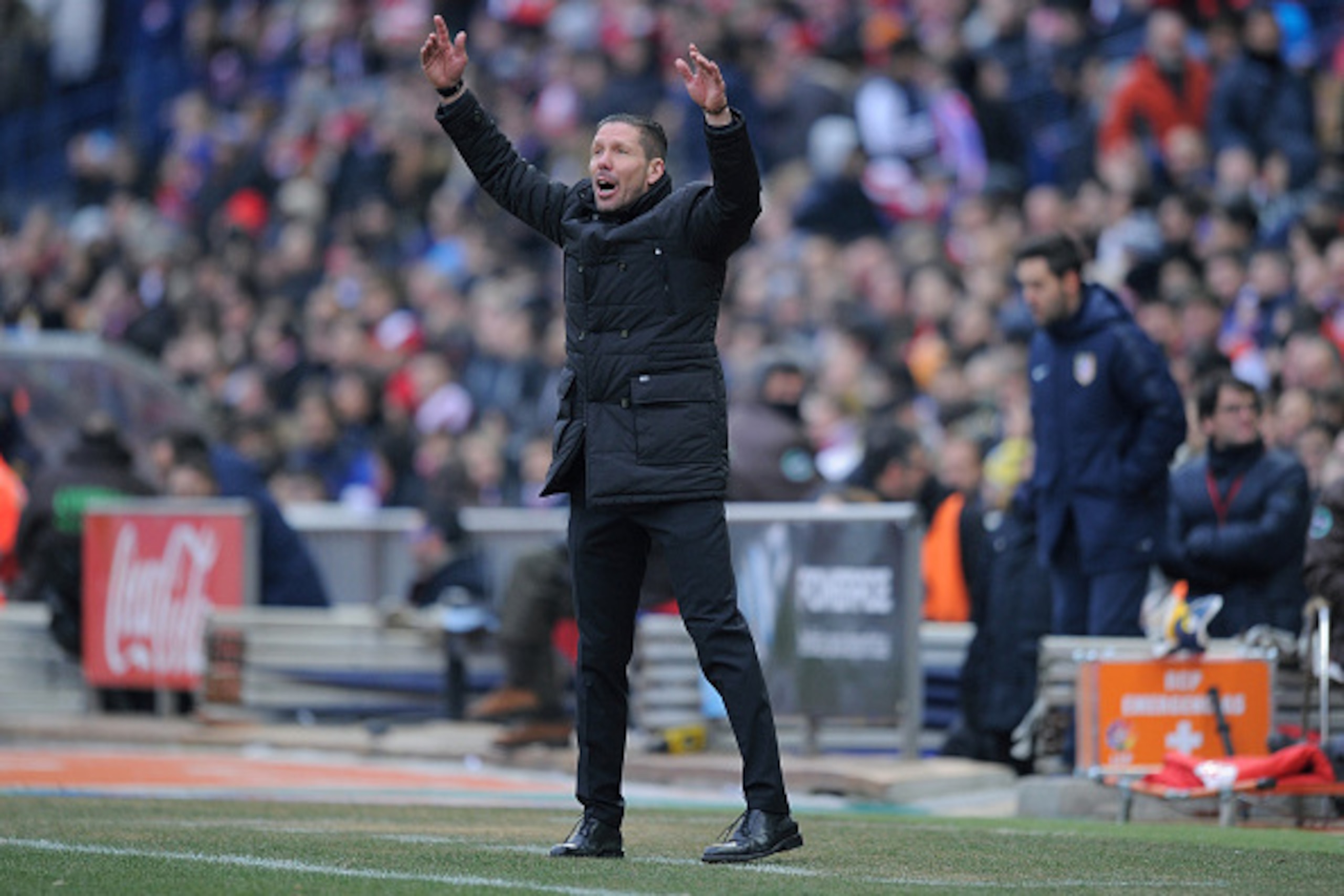 MADRID, SPAIN - FEBRUARY 07:  Head coach Diego Simeone of Club Atletico de Madrid reacts during the La Liga match between Club Atletico de Madrid and Real Madrid at Vicente Calderon Stadium on February 7, 2015 in Madrid, Spain.  (Photo by Denis Doyle/Gett