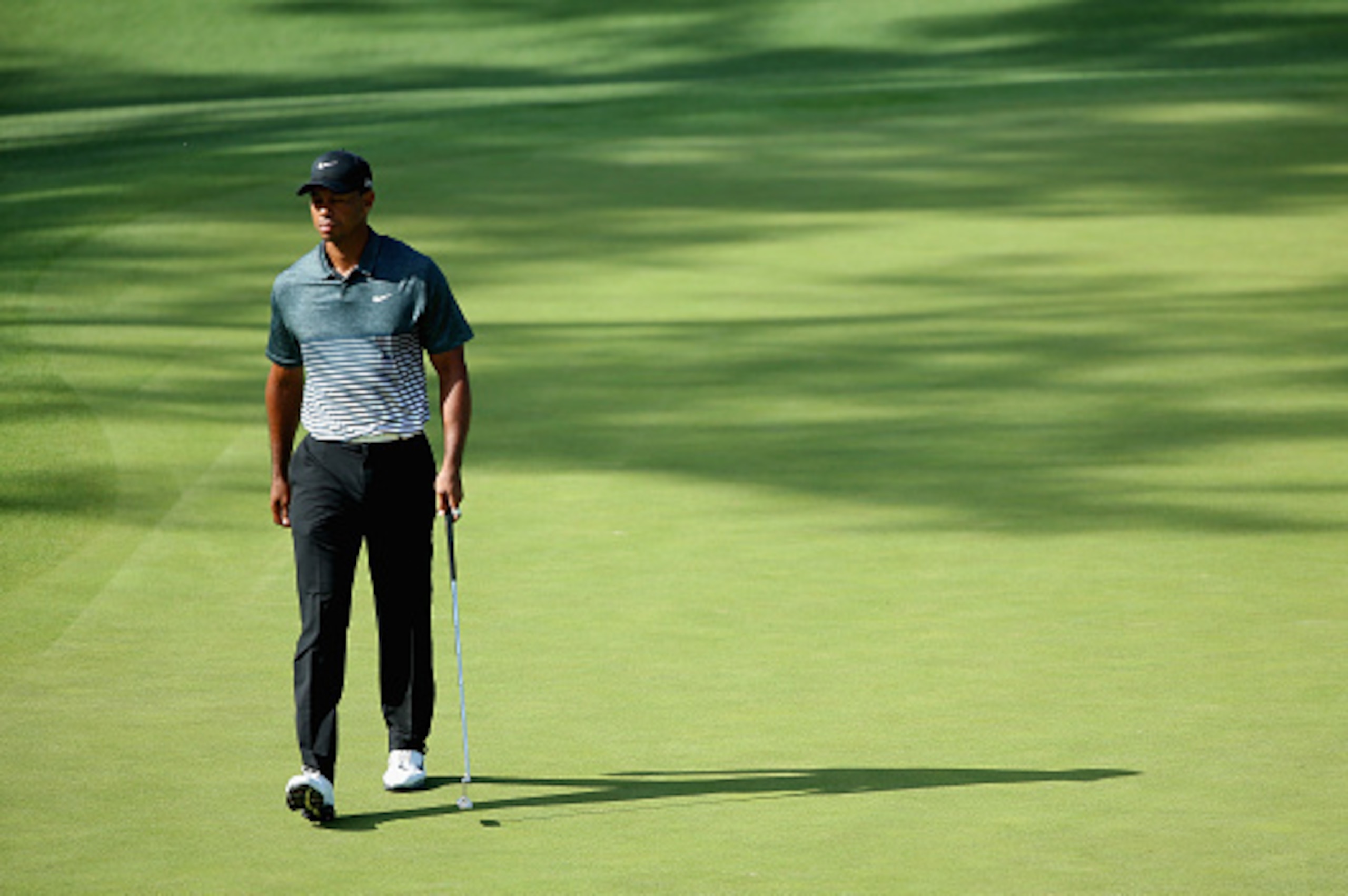 AUGUSTA, GA - APRIL 11:  Tiger Woods of the United States walks down a fairway during the third round of the 2015 Masters Tournament at Augusta National Golf Club on April 11, 2015 in Augusta, Georgia.  (Photo by Andrew Redington/Getty Images)