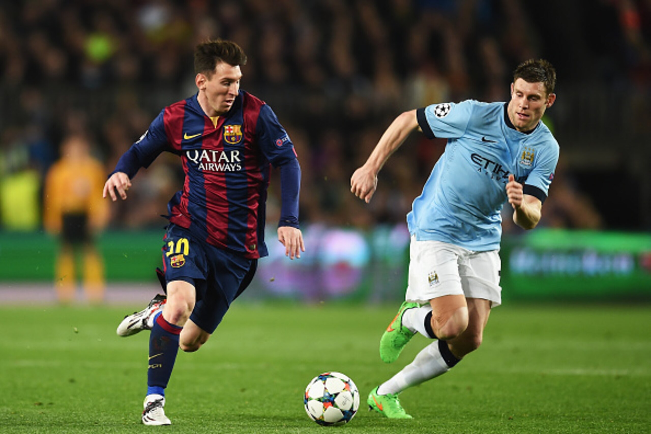 BARCELONA, SPAIN - MARCH 18:  Lionel Messi of Barcelona takes on James Milner of Manchester City during the UEFA Champions League Round of 16 second leg match between Barcelona and Manchester City at Camp Nou on March 18, 2015 in Barcelona, Spain.  (Photo