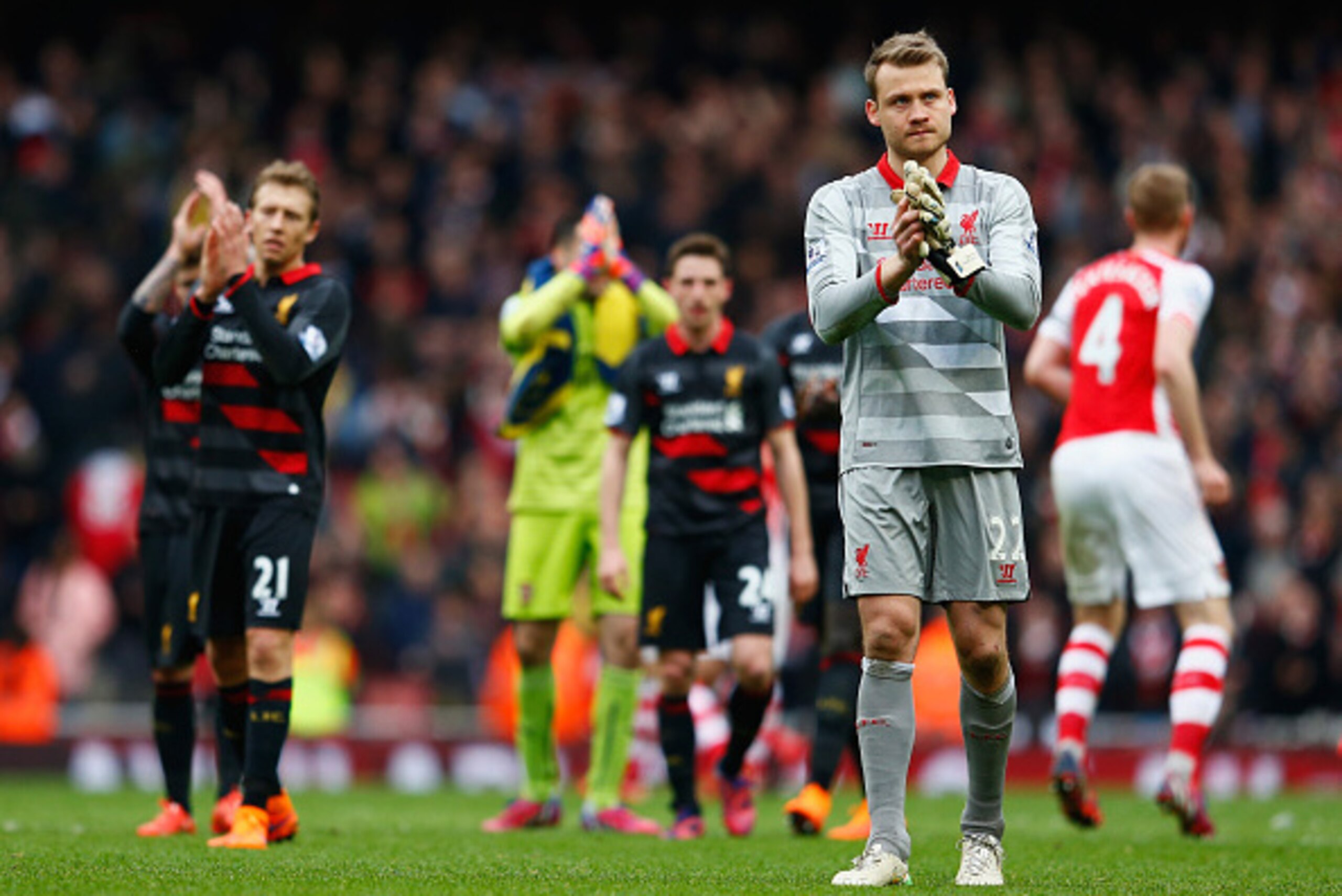 LONDON, ENGLAND - APRIL 04: Simon Mignolet of Liverpool applauds the fans after the Barclays Premier League match between Arsenal and Liverpool at Emirates Stadium on April 4, 2015 in London, England.  (Photo by Julian Finney/Getty Images)