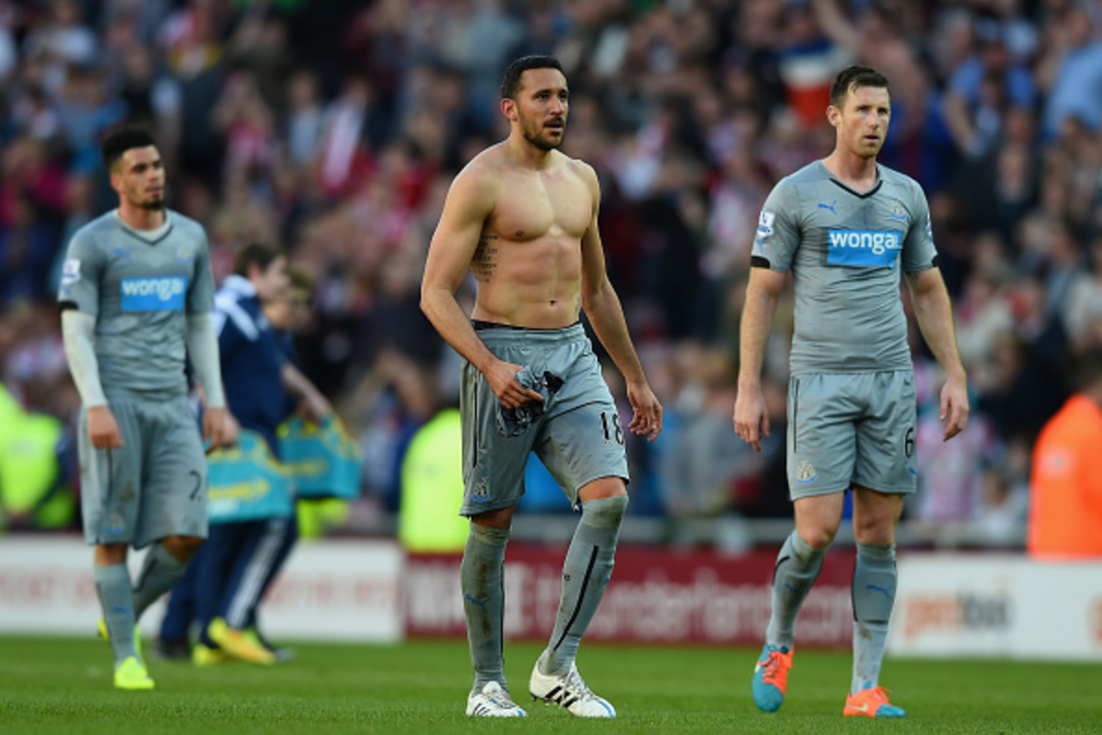 SUNDERLAND, ENGLAND - APRIL 05: Jonas Gutierrez of Newcastle United and Michael Williamson of Newcastle United look on after defeat in  the Barclays Premier League match between Sunderland and Newcastle United at Stadium of Light on April 5, 2015 in Sunde