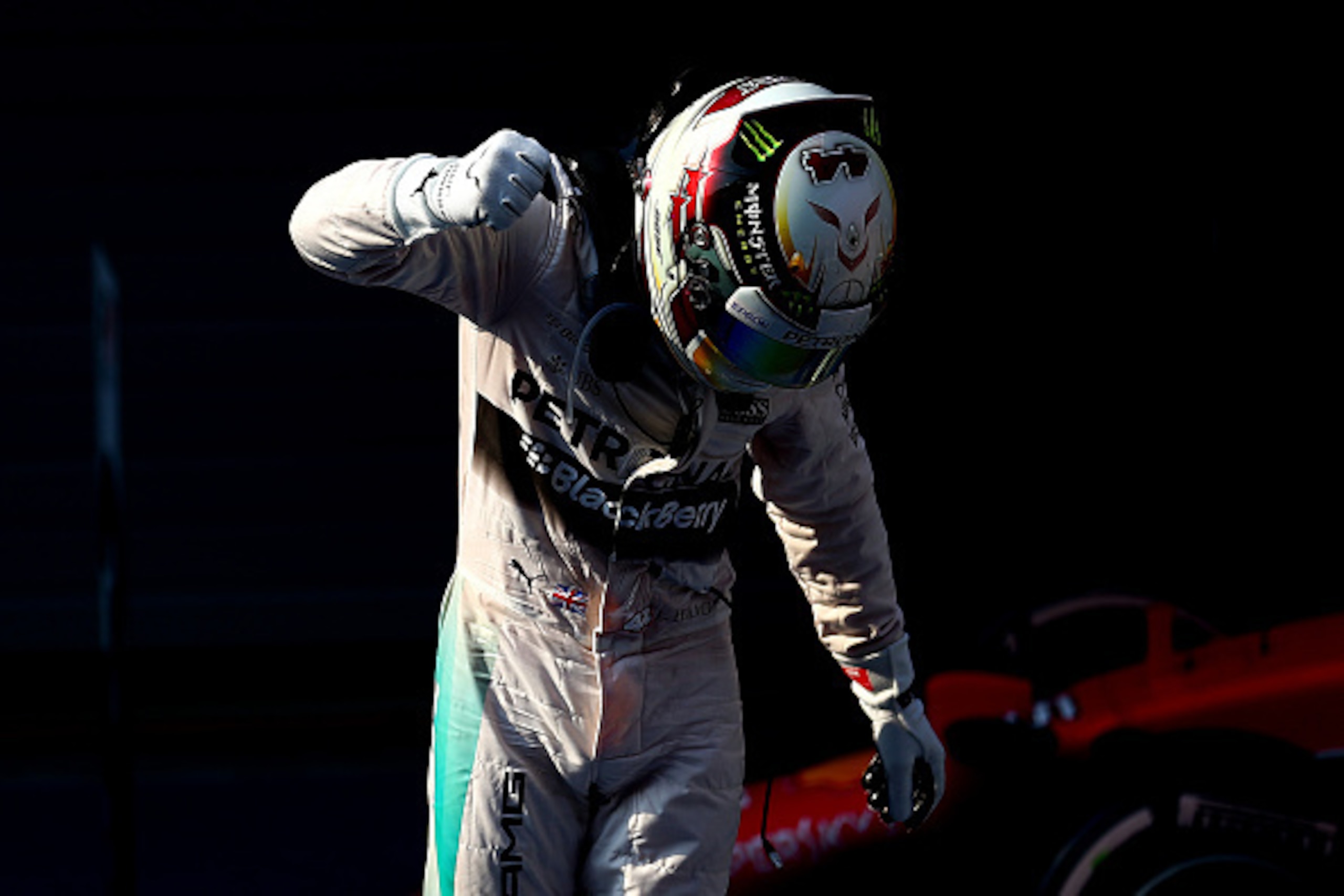 SHANGHAI, CHINA - APRIL 12:  Lewis Hamilton of Great Britain and Mercedes GP celebrates in Parc Ferme after winning the Formula One Grand Prix of China at Shanghai International Circuit on April 12, 2015 in Shanghai, China.  (Photo by Dan Istitene/Getty I