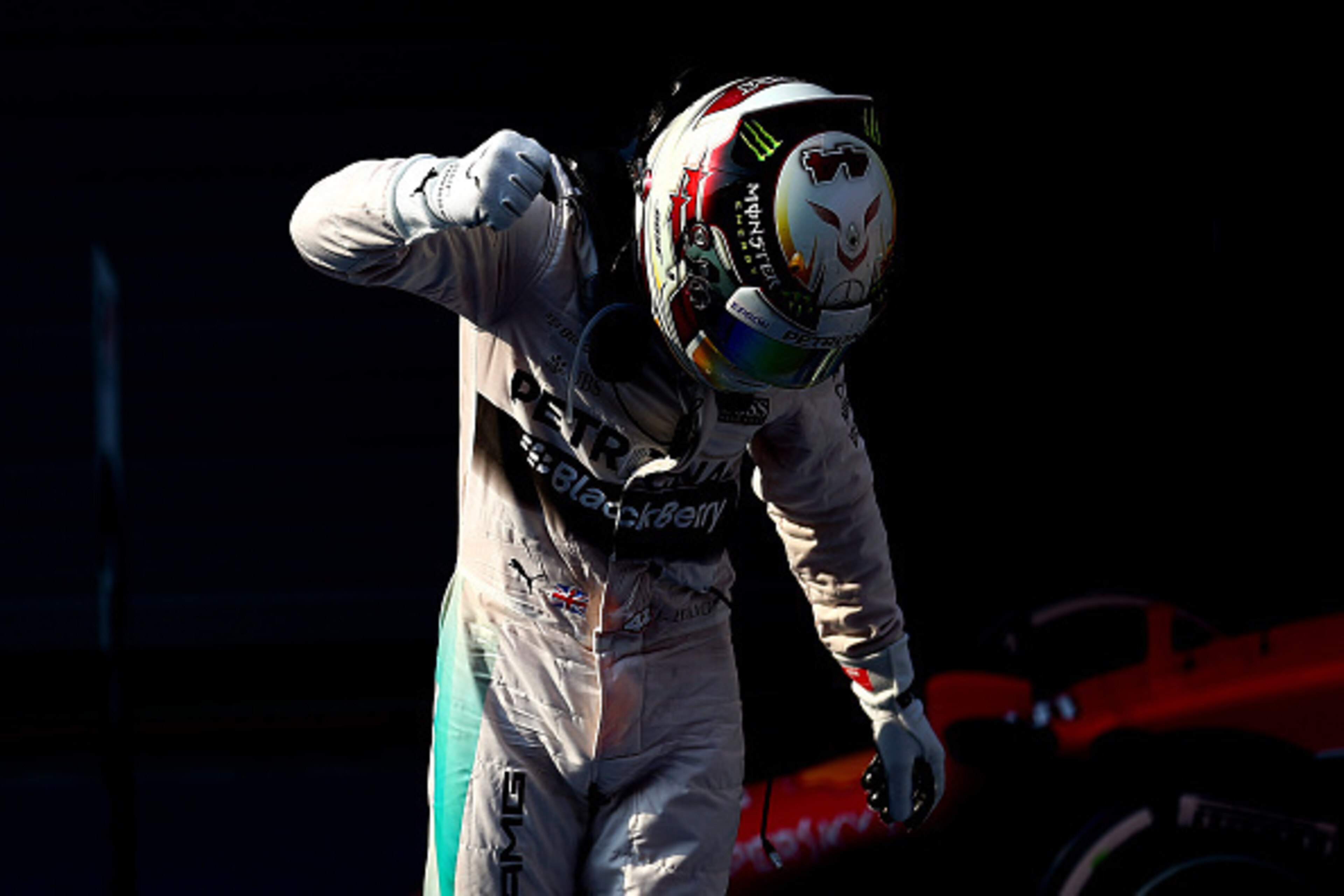 SHANGHAI, CHINA - APRIL 12:  Lewis Hamilton of Great Britain and Mercedes GP celebrates in Parc Ferme after winning the Formula One Grand Prix of China at Shanghai International Circuit on April 12, 2015 in Shanghai, China.  (Photo by Dan Istitene/Getty I