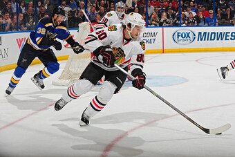 ST. LOUIS, MO - APRIL 9: Antoine Vermette #80 of the Chicago Blackhawks handles the puck against the St. Louis Blues on April 9, 2015 at the Scottrade Center in St. Louis, Missouri. (Photo by Jeff Curry/NHLI via Getty Images)