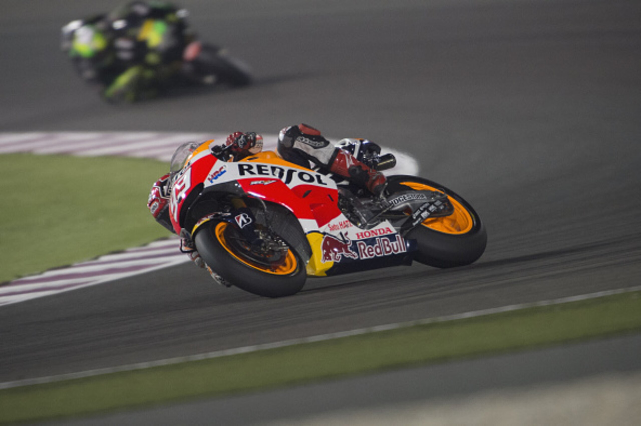 DOHA, QATAR - MARCH 29:  Marc Marquez of Spain and Repsol Honda Team rounds the bend during the MotoGP race during the MotoGp of Qatar - Race  at Losail Circuit on March 29, 2015 in Doha, Qatar.  (Photo by Mirco Lazzari gp/Getty Images)