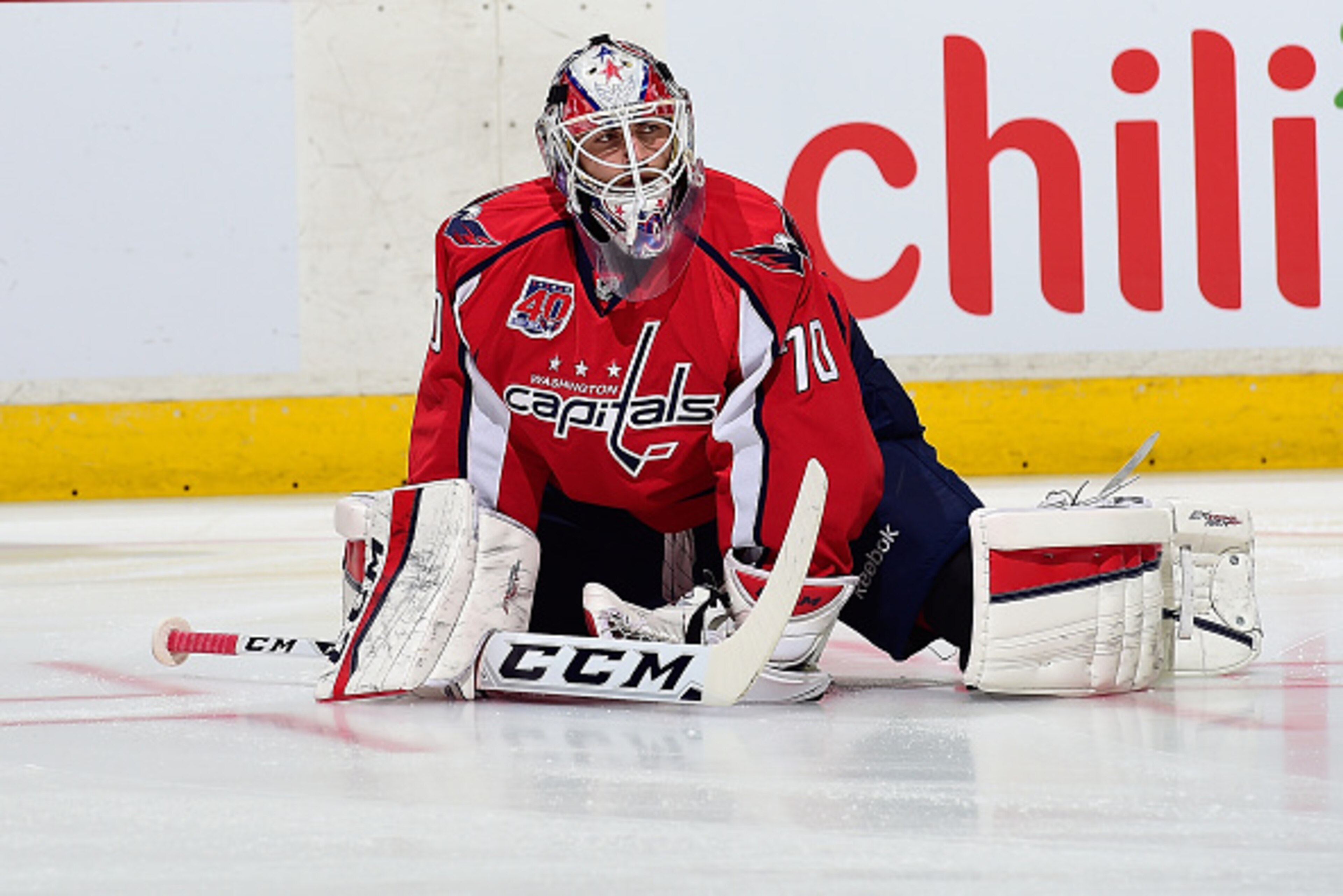 WASHINGTON, DC - APRIL 08:  Braden Holtby #70 of the Washington Capitals warms up prior to playing an NHL game against the Boston Bruins at Verizon Center on April 8, 2015 in Washington, DC.  (Photo by Patrick McDermott/NHLI via Getty Images)