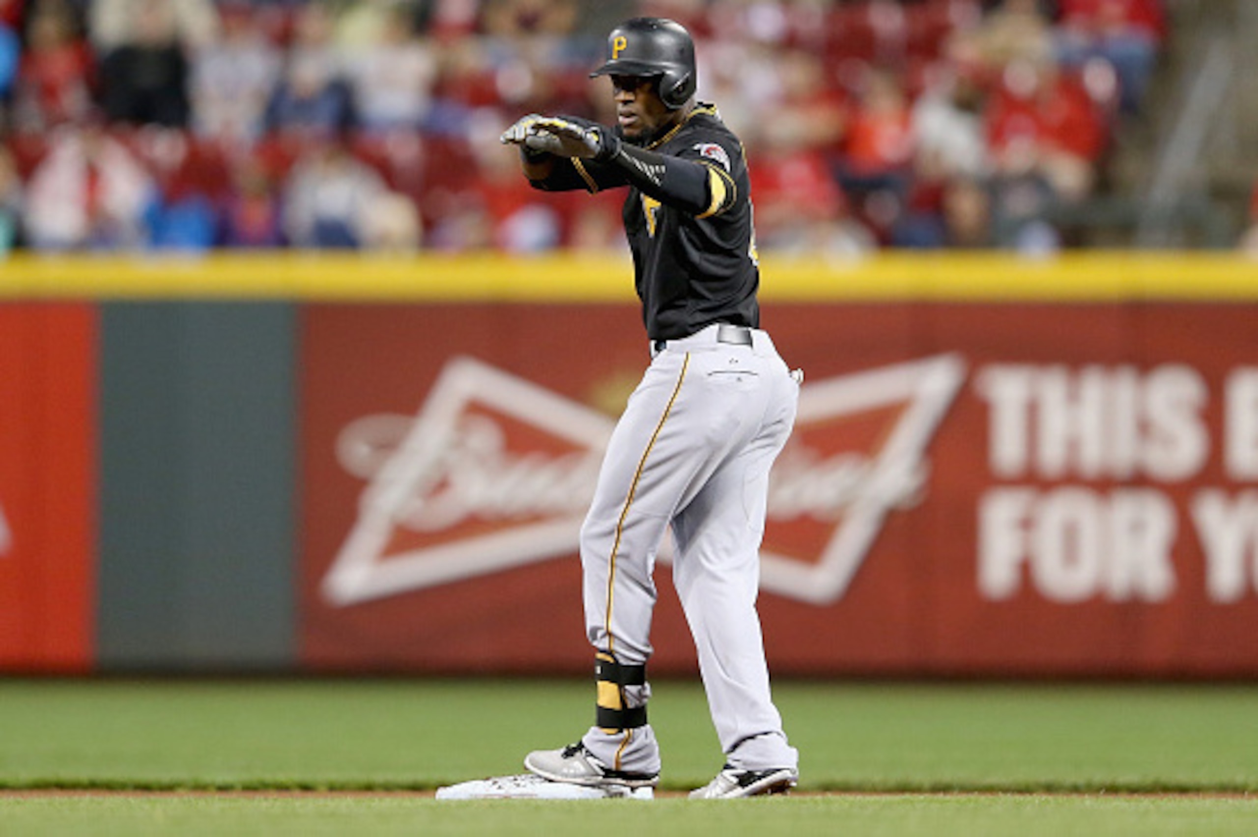CINCINNATI, OH - APRIL 08:  Starling Marte #6 of the Pittsburgh Pirates celebrates after hitting a double in the 4th inning against the Cincinnati Reds at Great American Ball Park on April 8, 2015 in Cincinnati, Ohio.  (Photo by Andy Lyons/Getty Images)