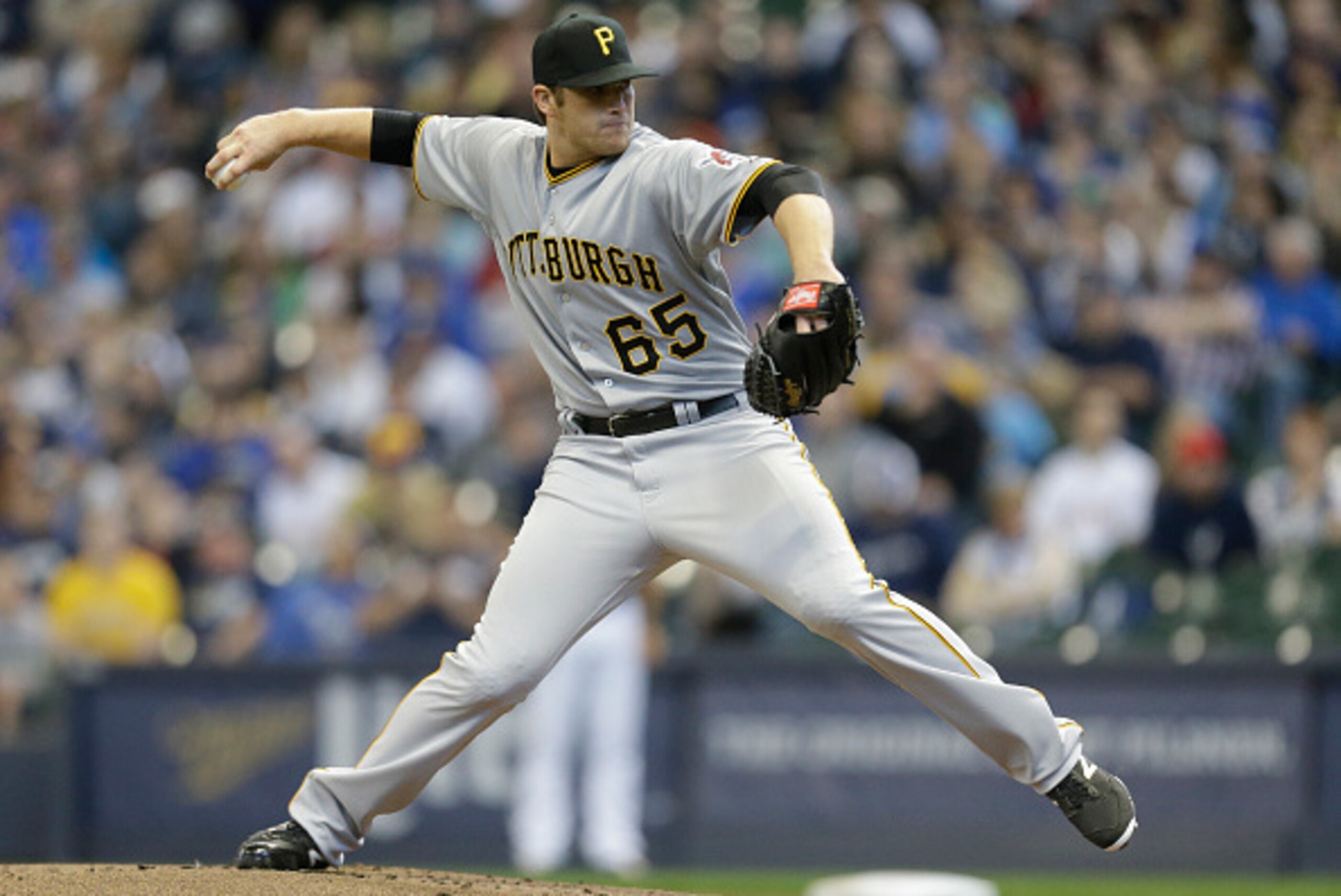 MILWAUKEE, WI - APRIL 12: Casey Sadler #65 if the Pittsburgh throws in the first inning against the Milwaukee Brewers at Miller Park on April 12, 2015 in Milwaukee, Wisconsin.  (Photo by Jeffrey Phelps/Getty Images)