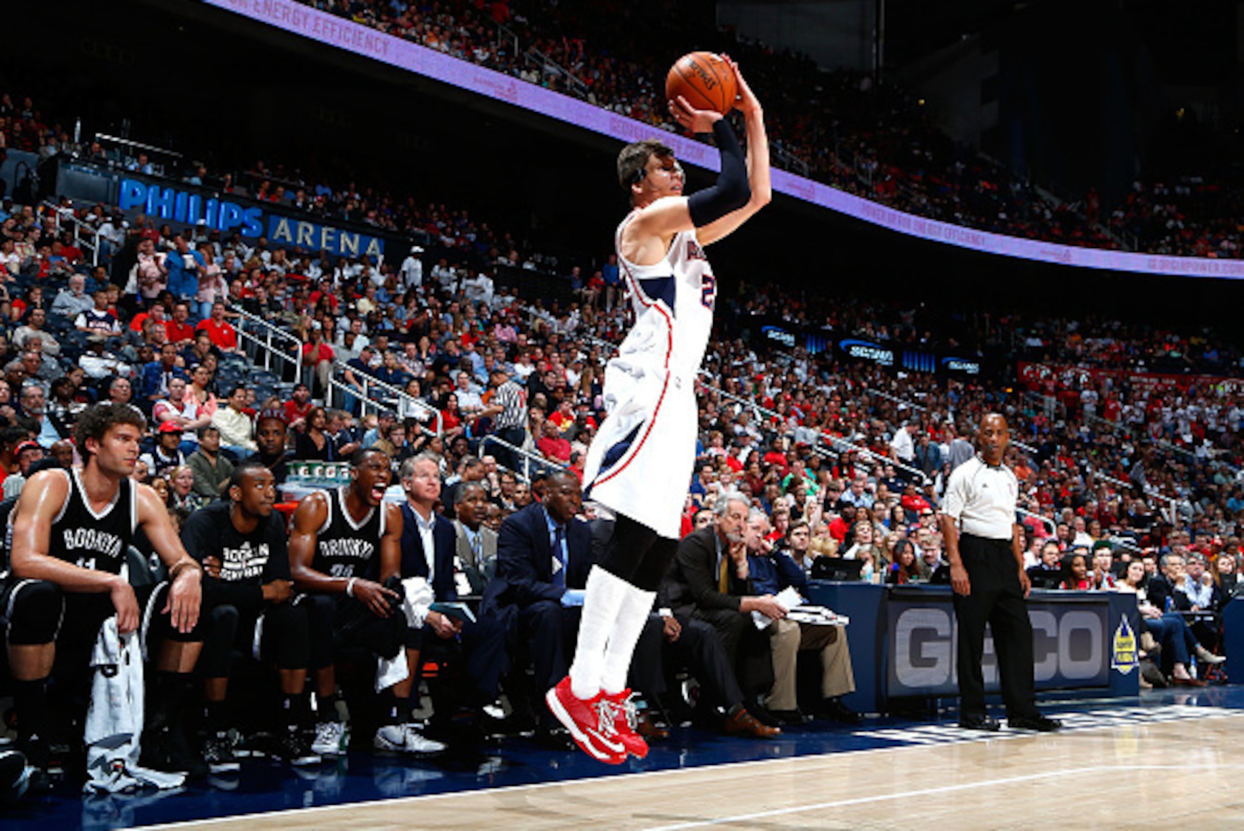 ATLANTA, GA - APRIL 04:  Kyle Korver #26 of the Atlanta Hawks shoots a three-point basket against the Brooklyn Nets at Philips Arena on April 4, 2015 in Atlanta, Georgia.  NOTE TO USER: User expressly acknowledges and agrees that, by downloading and/or us