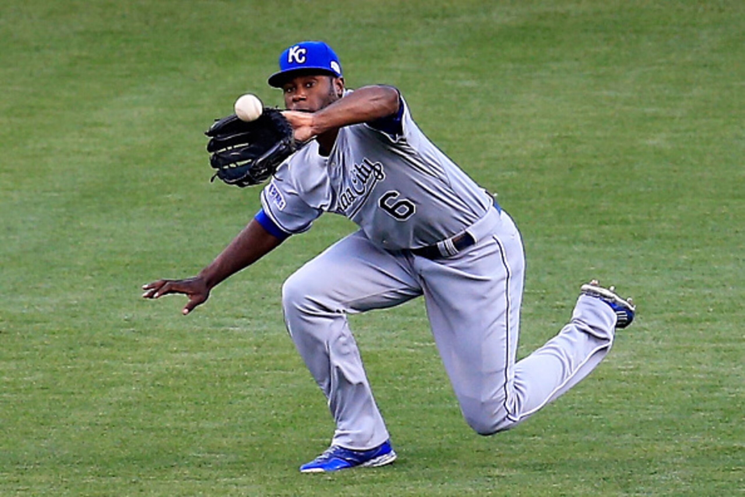 SAN FRANCISCO, CA - OCTOBER 24:  Lorenzo Cain #6 of the Kansas City Royals makes a catch in centerfield for the third out in the first inning against the San Francisco Giants during Game Three of the 2014 World Series at AT&T Park on October 24, 2014 in S