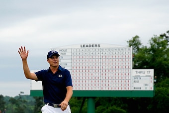 AUGUSTA, GA - APRIL 12:  Jordan Spieth of the United States walks off the 18th green after his four-stroke victory at the 2015 Masters Tournament at Augusta National Golf Club on April 12, 2015 in Augusta, Georgia.  (Photo by Ezra Shaw/Getty Images)