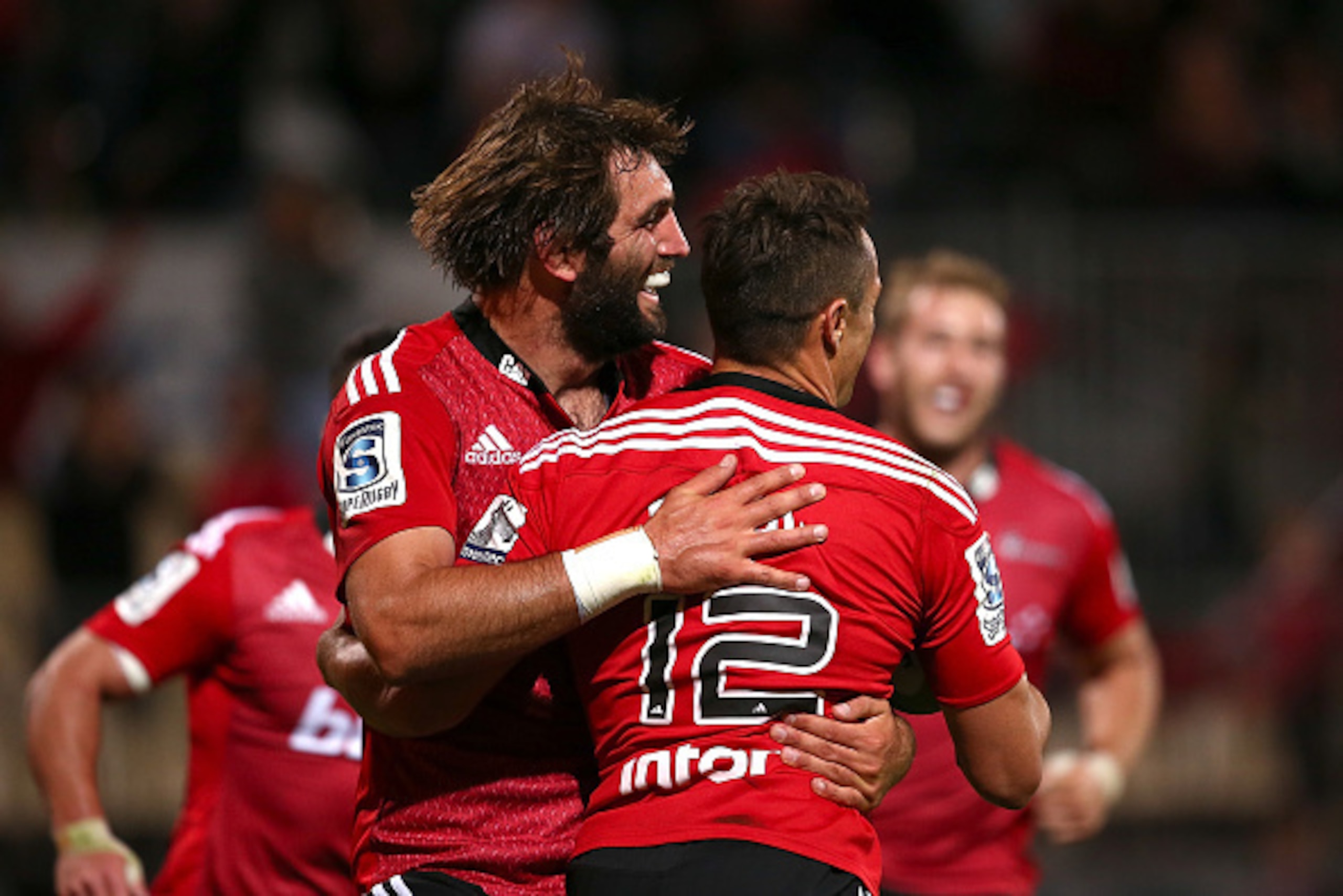 CHRISTCHURCH, NEW ZEALAND - MARCH 21:  Dan Carter and Sam Whitelocke both of the Crusaders celebrate after scoring a try during the round six Super Rugby match between the Crusaders and the Cheetahs at AMI Stadium on March 21, 2015 in Christchurch, New Ze