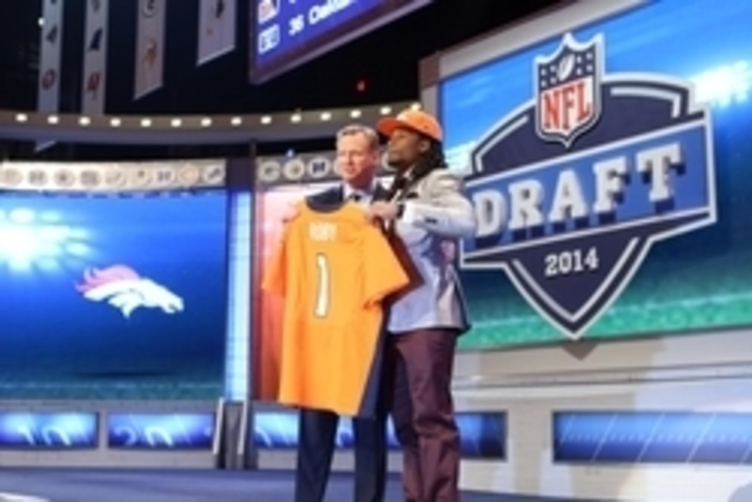 May 8, 2014; New York, NY, USA; Bradley Roby (Ohio State) poses with Roger Goodell after being selected as the number thirty-one overall pick in the first round of the 2014 NFL Draft to the Denver Broncos at Radio City Music Hall. Mandatory Credit: Adam H