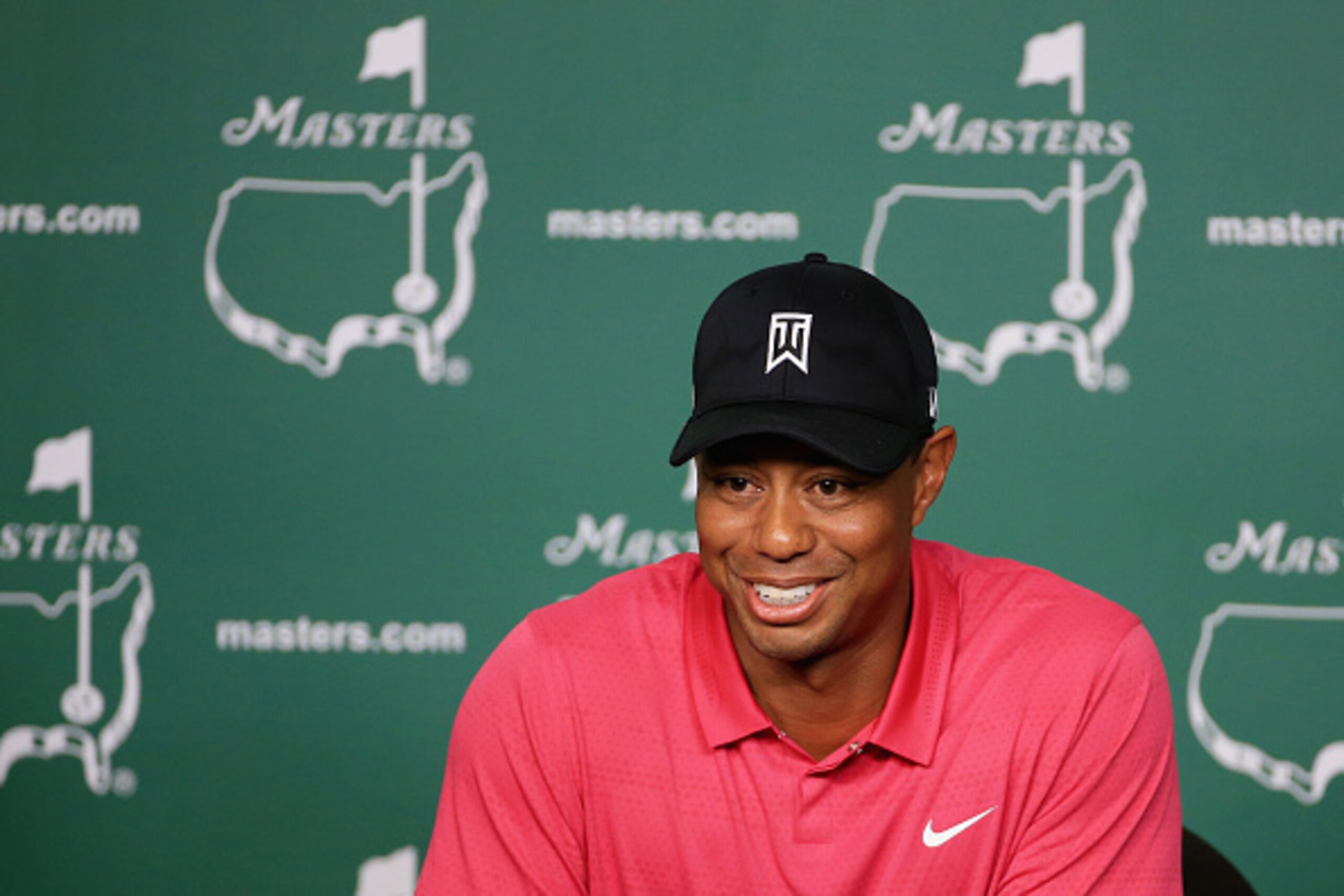 AUGUSTA, GA - APRIL 07:  Tiger Woods of the United States speaks to the media during a practice round prior to the start of the 2015 Masters Tournament at Augusta National Golf Club on April 7, 2015 in Augusta, Georgia.  (Photo by David Cannon/Getty Image