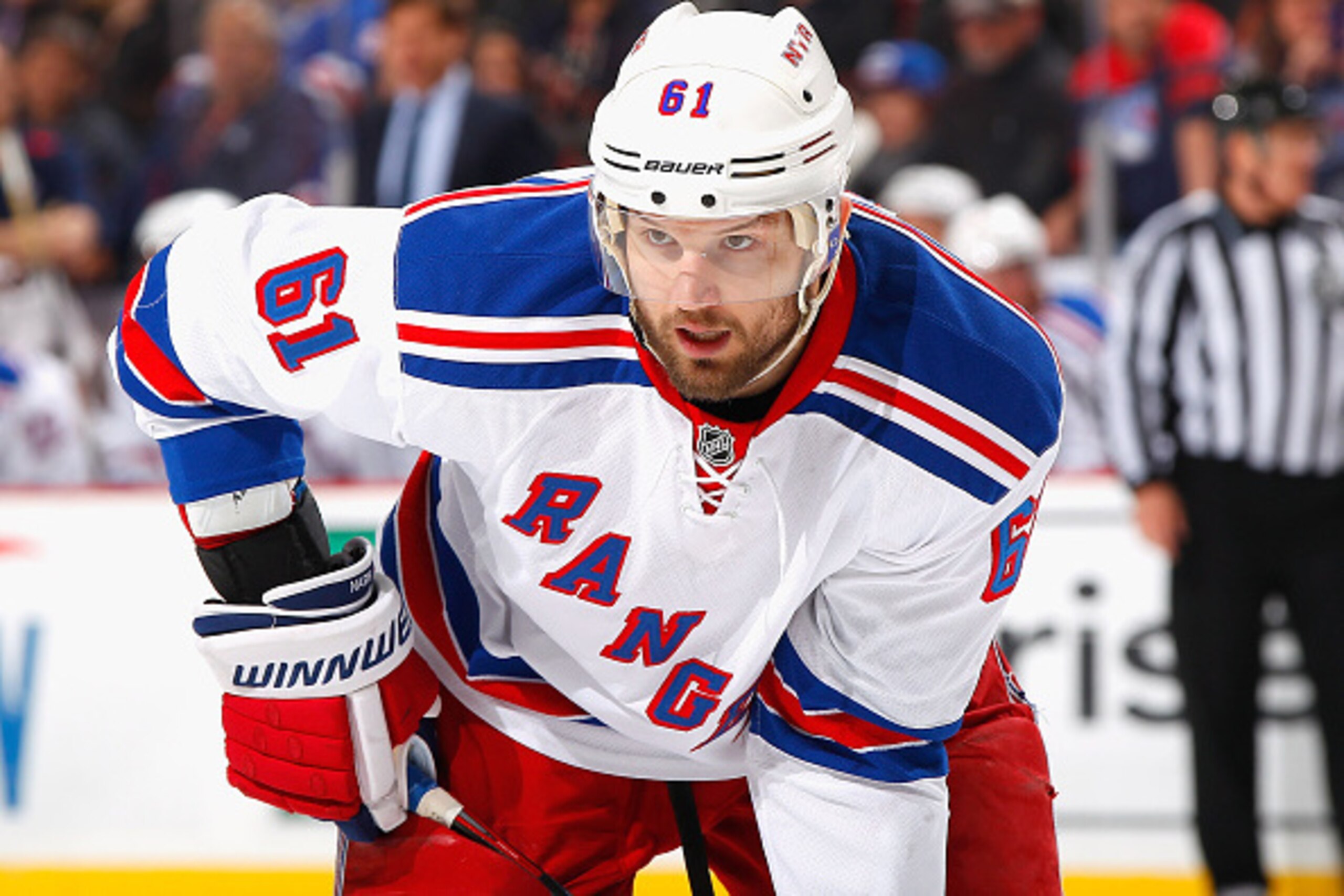 NEWARK, NJ - APRIL 07: Rick Nash #61 of the New York Rangers looks on against the New Jersey Devils during the game at the Prudential Center on April 7, 2015 in Newark, New Jersey. (Photo by Andy Marlin/NHLI via Getty Images)