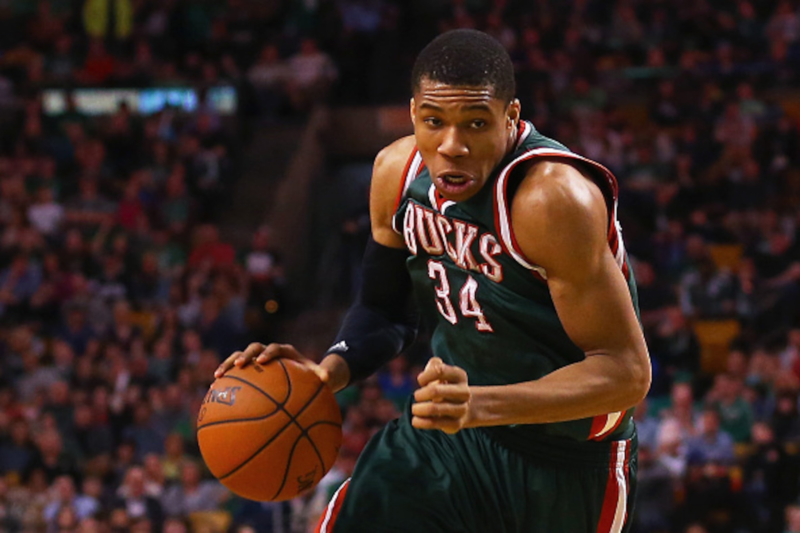 BOSTON, MA - APRIL 03:  Giannis Antetokounmpo #34 of the Milwaukee Bucks carries the ball against the Boston Celtics during the fourth quarter at TD Garden on April 3, 2015 in Boston, Massachusetts. The Bucks defeat the Celtics 110-101. NOTE TO USER: User