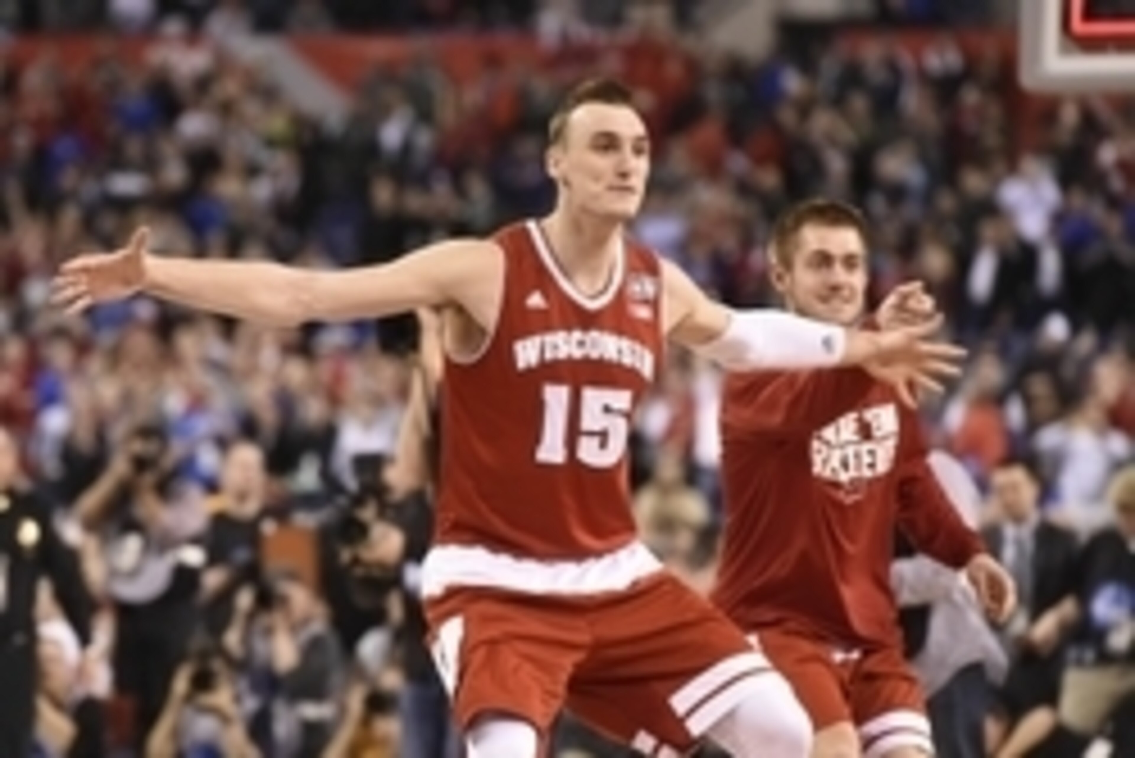 Apr 4, 2015; Indianapolis, IN, USA; Wisconsin Badgers forward Sam Dekker (15) celebrates after defeating the Kentucky Wildcats 71-64 in the 2015 NCAA Men's Division I Championship semi-final game at Lucas Oil Stadium. Mandatory Credit: Robert Deutsch-USA Apr 4, 2015; Indianapolis, IN, USA; Wisconsin Badgers forward Sam Dekker (15) celebrates after defeating the Kentucky Wildcats 71-64 in the 2015 NCAA Men's Division I Championship semi-final game at Lucas Oil Stadium. Mandatory Credit: Robert Deutsch-USA