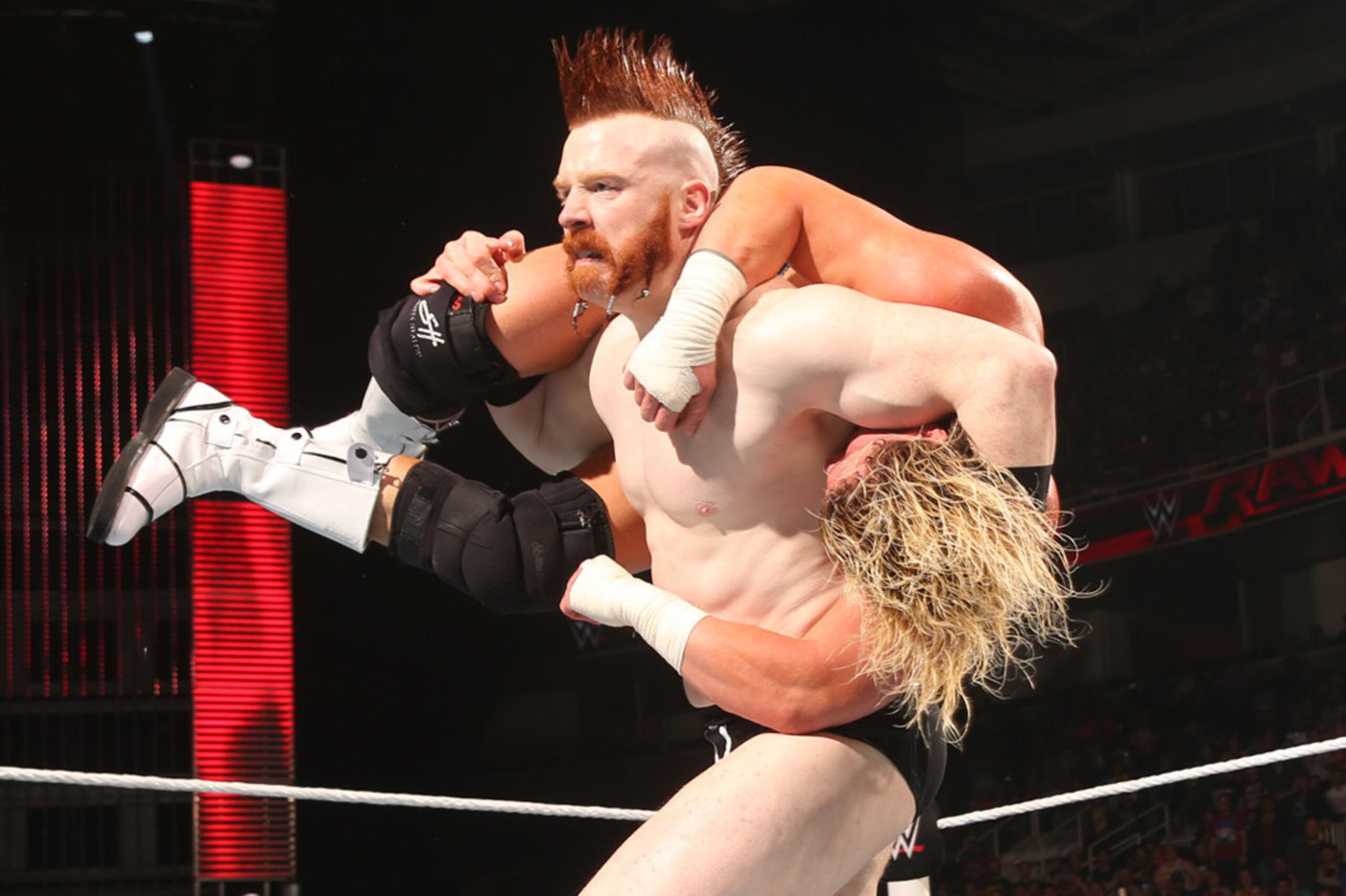 Sheamus readies Dolph Ziggler for White Noise. Sheamus readies Dolph Ziggler for White Noise.
