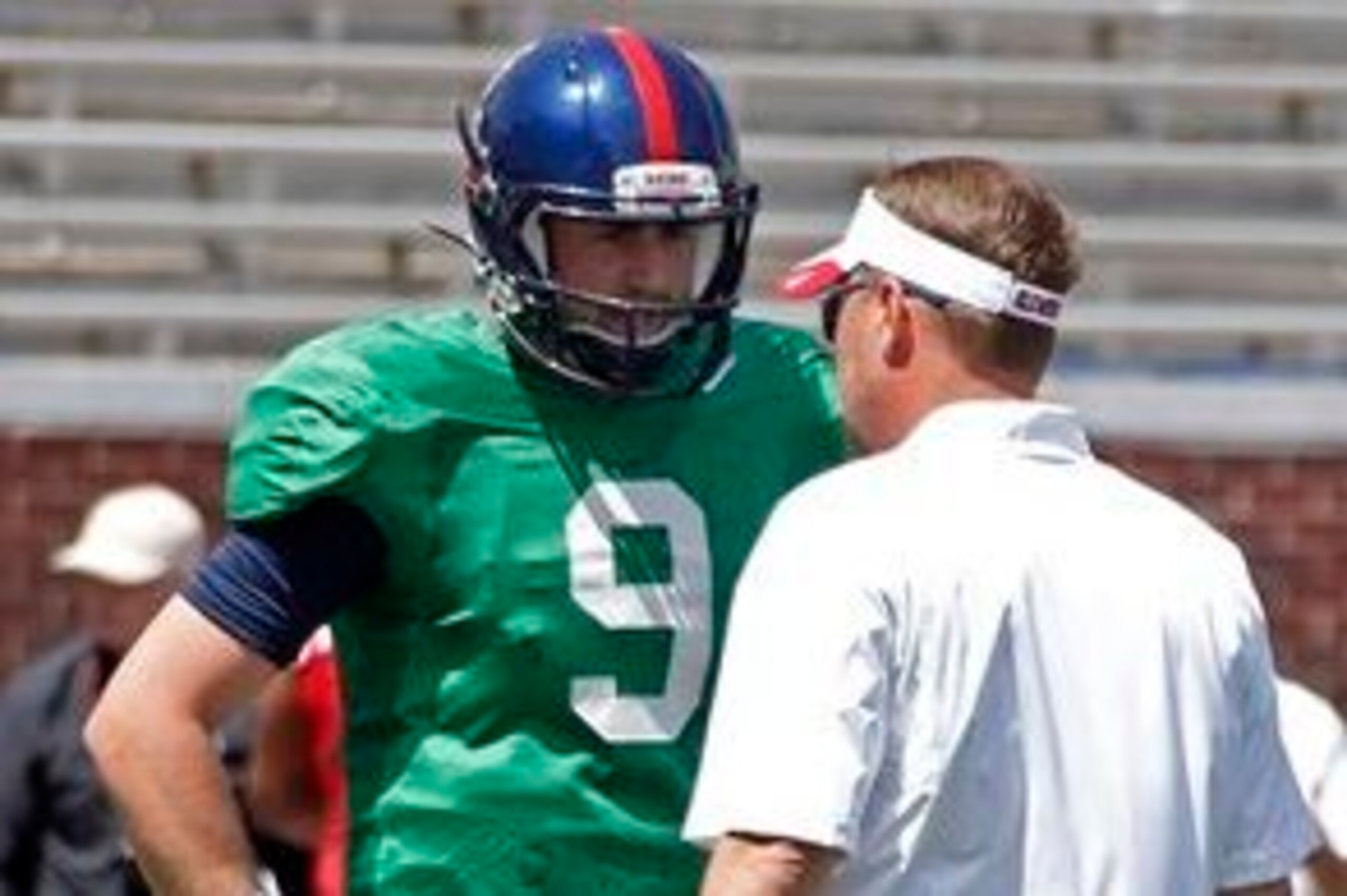 Ole Miss QB Ryan Buchanan (left) and head coach Hugh Freeze (right)