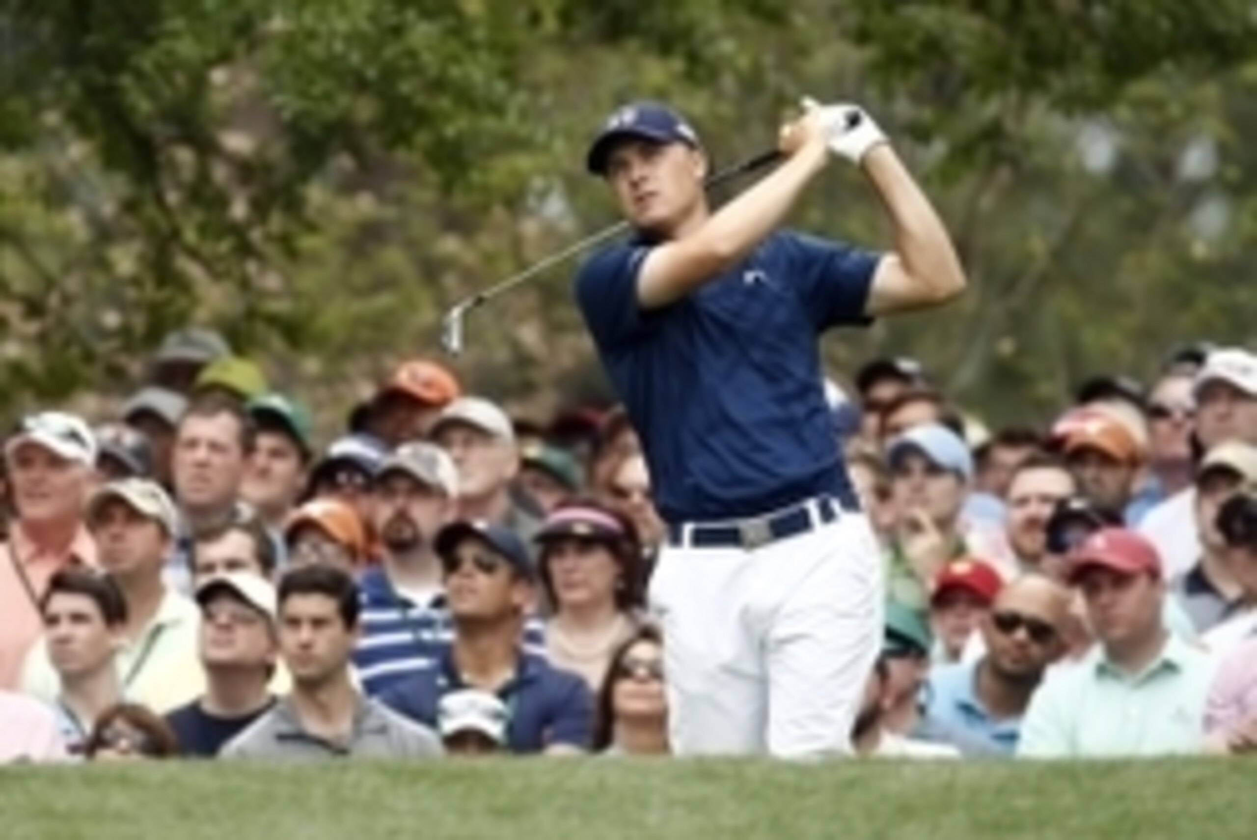 Apr 12, 2015; Augusta, GA, USA; Jordan Spieth hits his tee shot on the 4th hole during the final round of The Masters golf tournament at Augusta National Golf Club. Mandatory Credit: Rob Schumacher-USA TODAY Sports