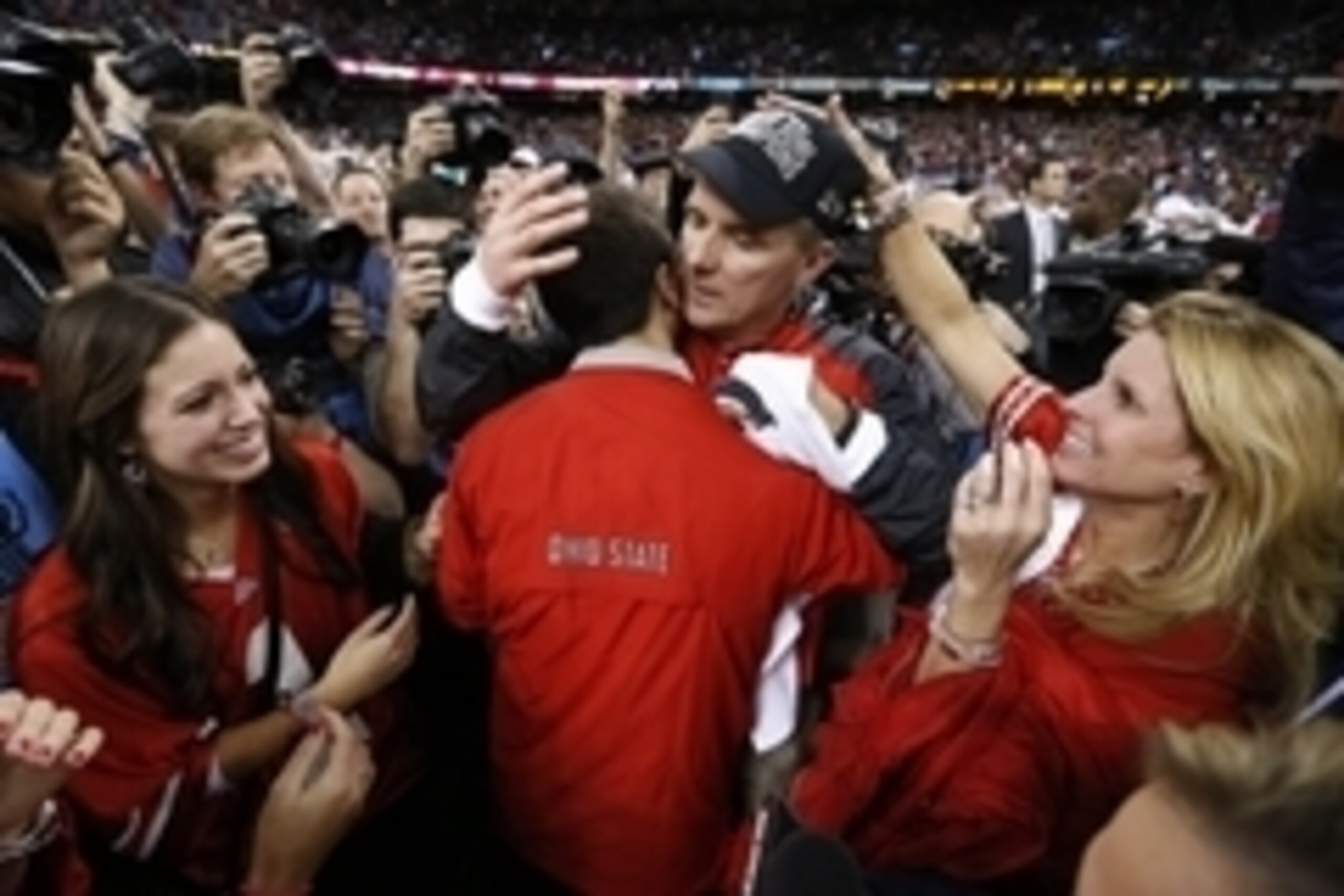 Jan 1, 2015; New Orleans, LA, USA; Ohio State Buckeyes head coach Urban Meyer celebrates with his family after the 2015 Sugar Bowl against the Alabama Crimson Tide at Mercedes-Benz Superdome. Ohio State defeated Alabama 42-35. Mandatory Credit:  Matthew E