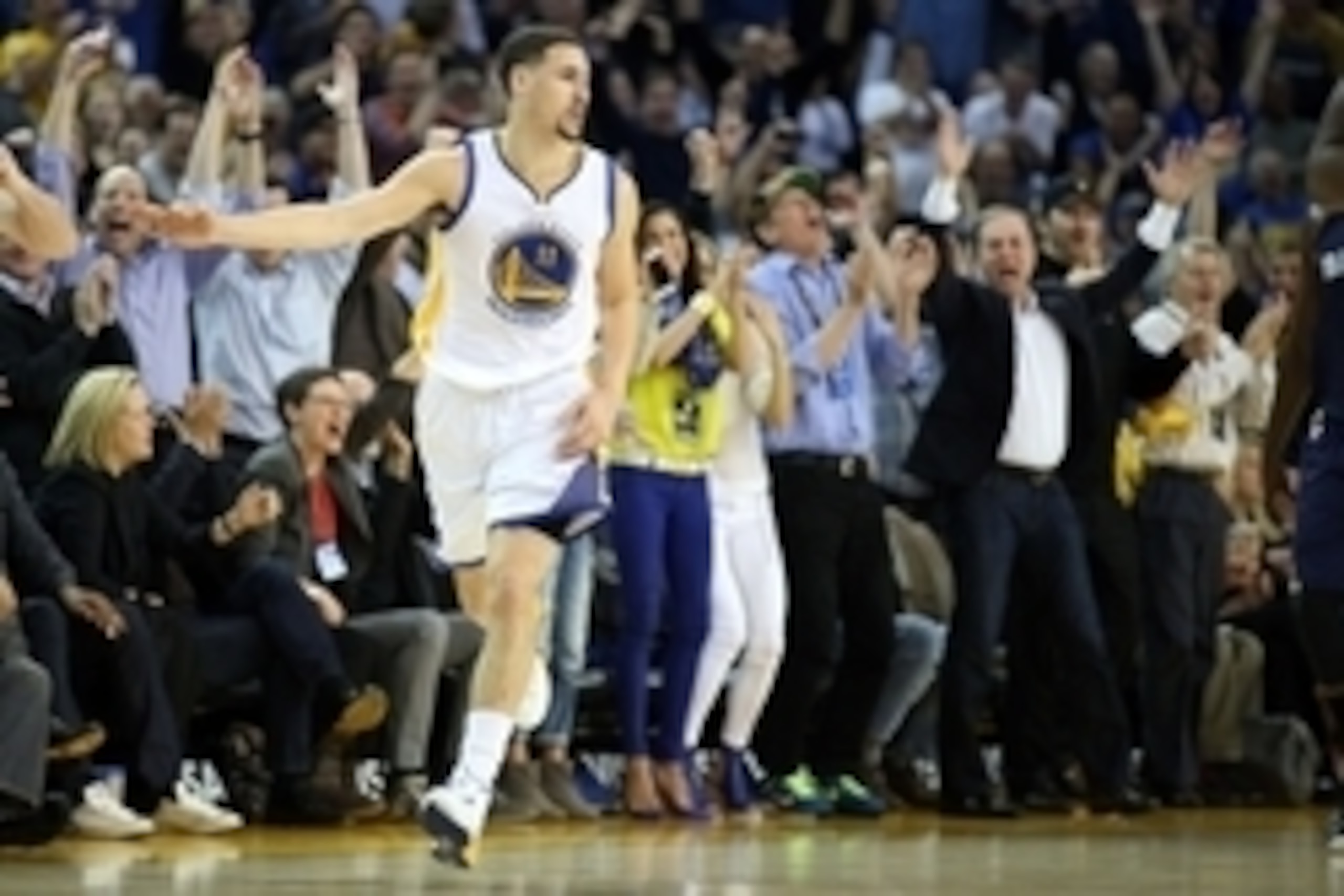 Apr 13, 2015; Oakland, CA, USA; Golden State Warriors guard Klay Thompson (11) celebrates ahead of majority owner Joe Lacob after a three point basket against the Memphis Grizzlies during the second quarter at Oracle Arena. Mandatory Credit: Kelley L Cox Apr 13, 2015; Oakland, CA, USA; Golden State Warriors guard Klay Thompson (11) celebrates ahead of majority owner Joe Lacob after a three point basket against the Memphis Grizzlies during the second quarter at Oracle Arena. Mandatory Credit: Kelley L Cox