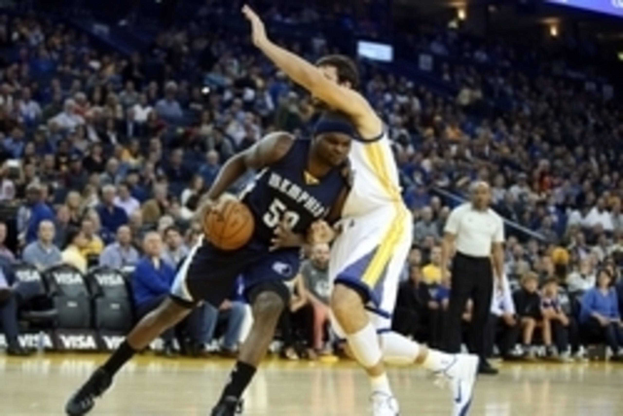 Apr 13, 2015; Oakland, CA, USA; Memphis Grizzlies forward Zach Randolph (50) drives in against Golden State Warriors center Andrew Bogut (12) during the first quarter at Oracle Arena. Mandatory Credit: Kelley L Cox-USA TODAY Sports