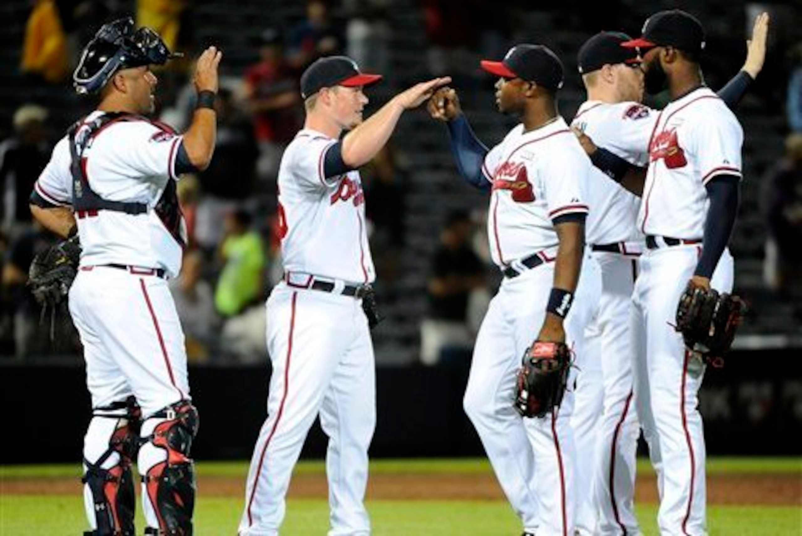 Of the five players in this picture, taken last August, only Freddie Freeman (second from right) remains on the Braves in 2015.
