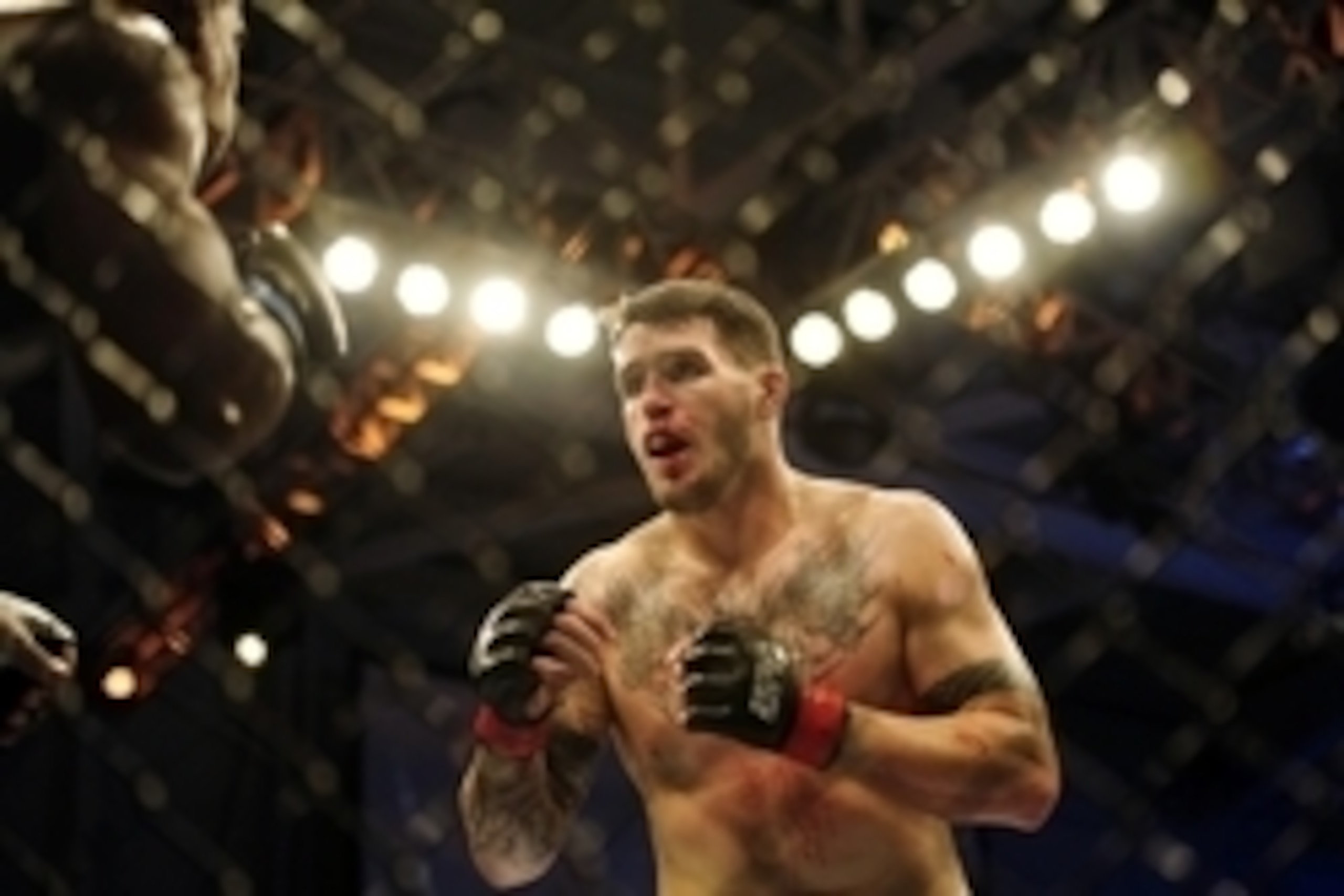 Nov 6, 2013; Fort Campbell, KY, USA; Chris Camozzi (red gloves) fights Lorenz Larkin (blue gloves) in the middleweight bout during UFC Fight for the Troops at Fort Campbell. Mandatory Credit: Joshua Lindsey-USA TODAY Sports