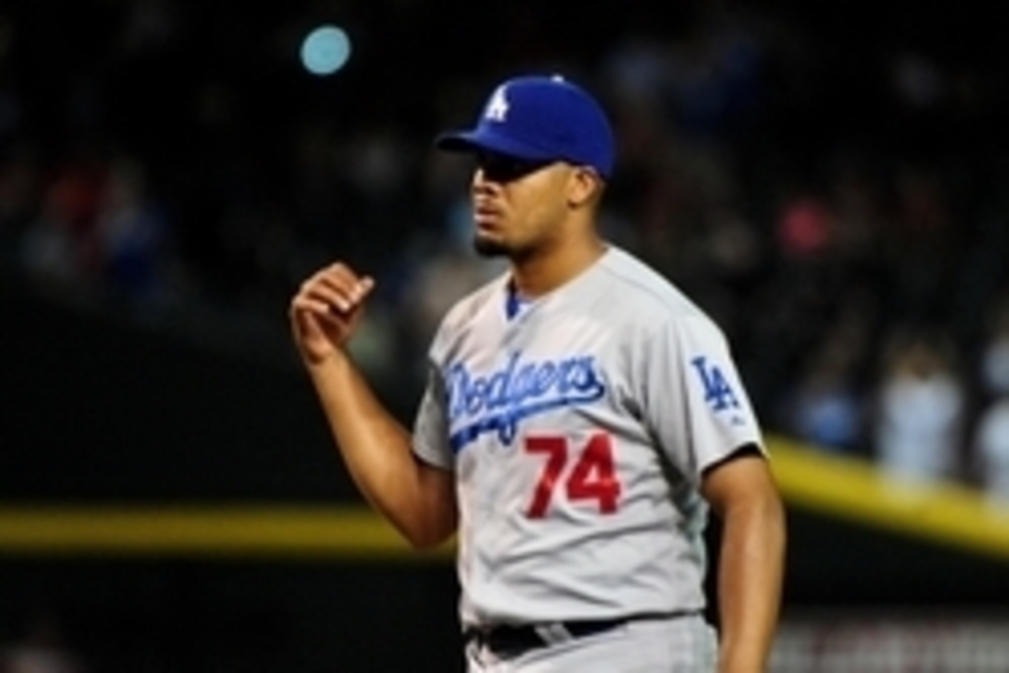 Aug 27, 2014; Phoenix, AZ, USA; Los Angeles Dodgers relief pitcher Kenley Jansen (74) celebrates after beating the Arizona Diamondbacks 3-1 at Chase Field. Mandatory Credit: Matt Kartozian-USA TODAY Sports