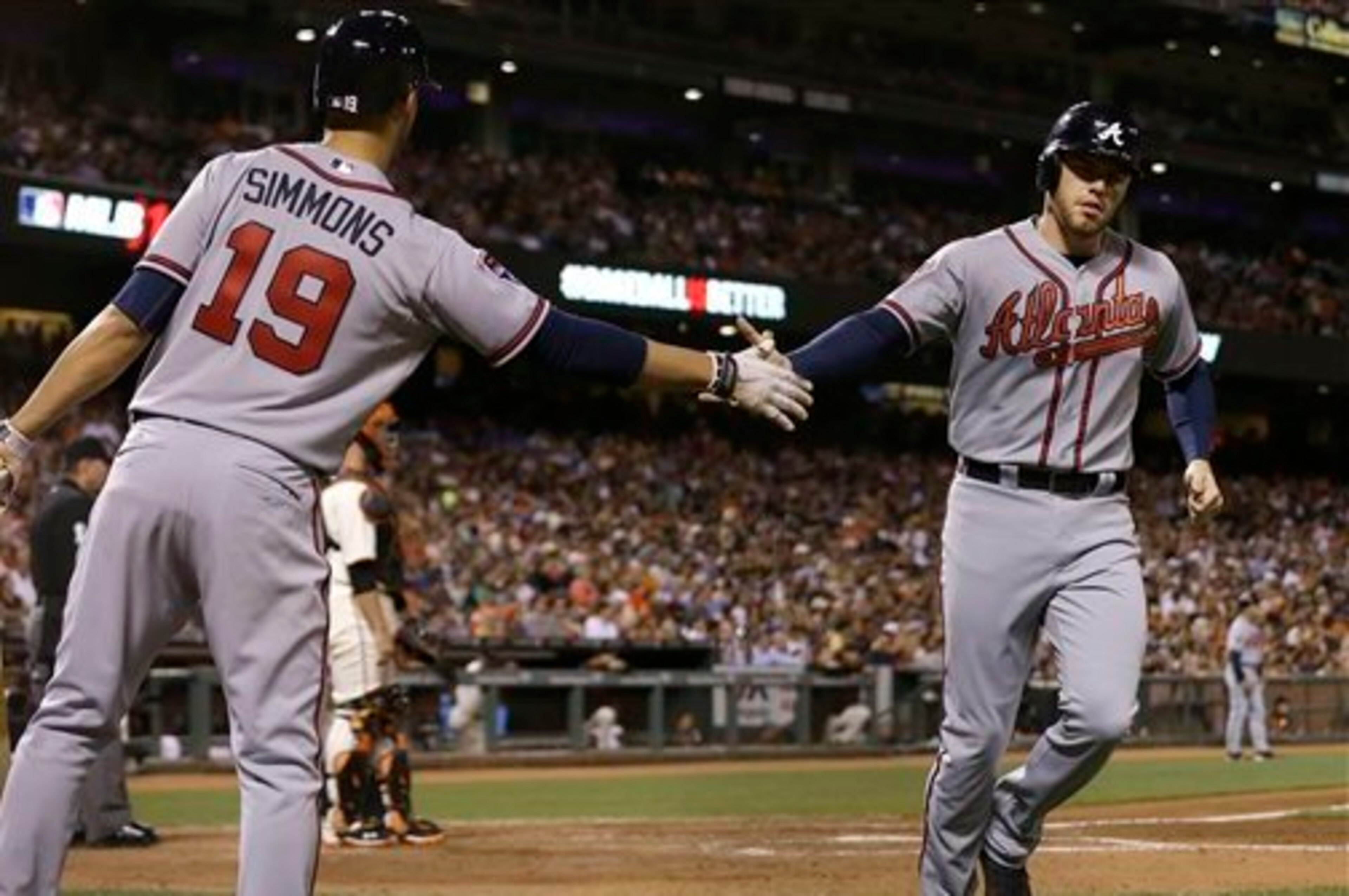 Foundation pieces Andrelton Simmons and Freddie Freeman are staying in Atlanta.