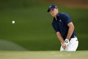 Apr 12, 2015; Augusta, GA, USA; Jordan Spieth chips onto the 7th green during the final round of The Masters golf tournament at Augusta National Golf Club. Mandatory Credit: Michael Madrid-USA TODAY Sports