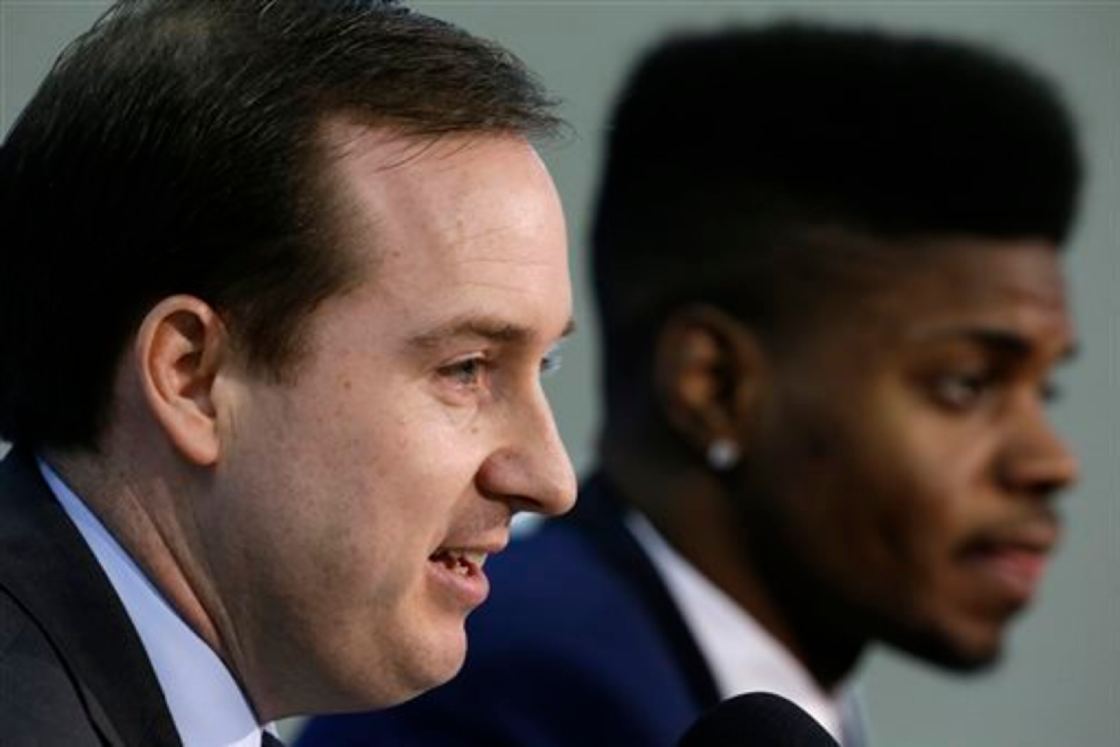 Noel and Sam Hinkie during a press conference.