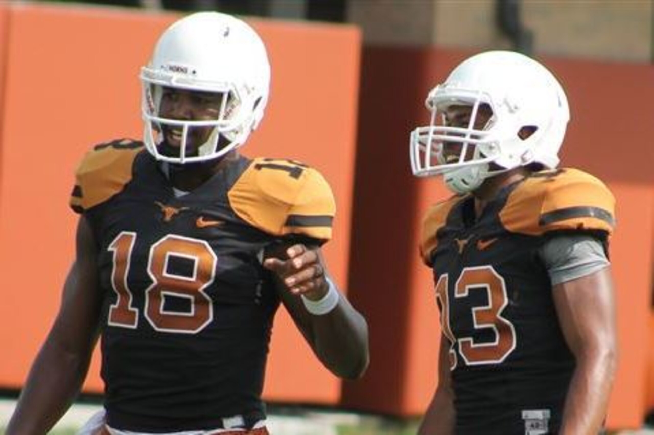 Will Swoopes (left) be able to hold off the speedy Heard (right) for the starting quarterback job?