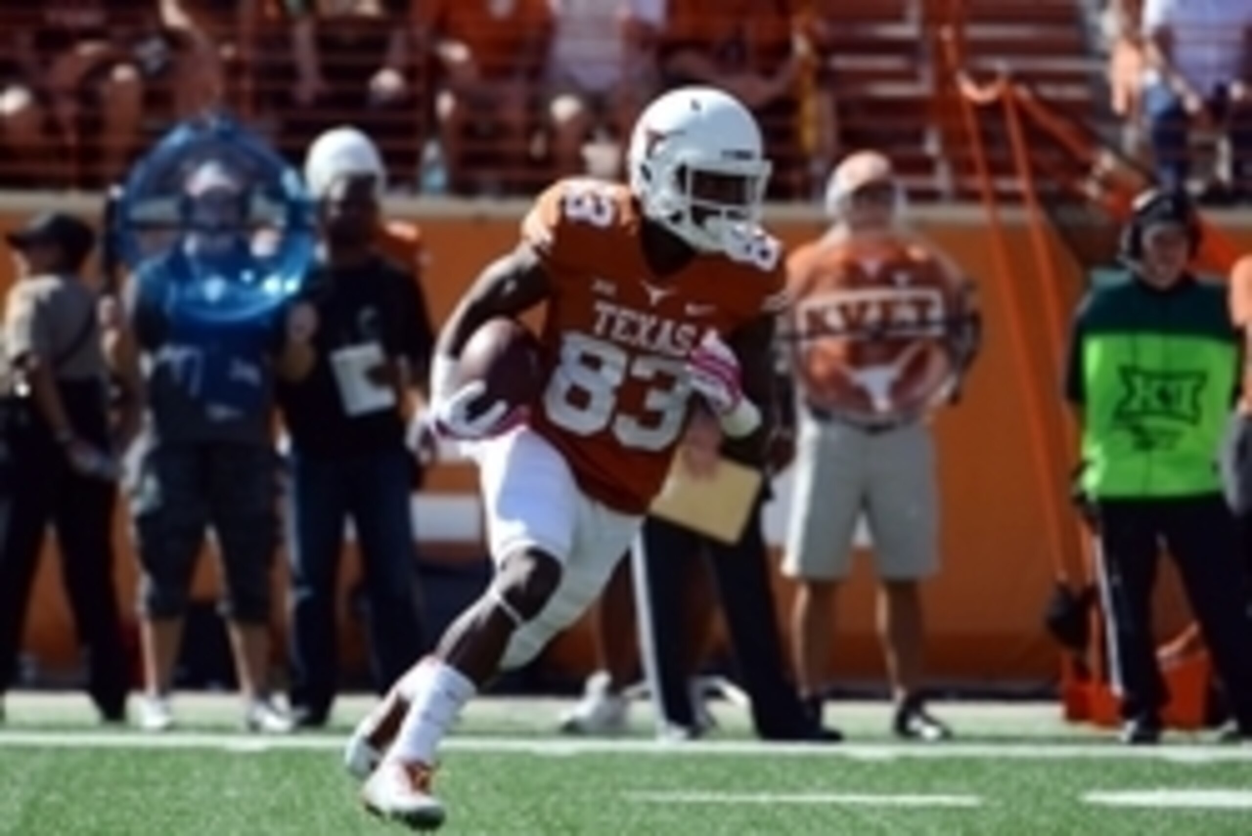 Austin, TX, USA; Texas Longhorns wide receiver Armanti Foreman (83) carries the ball against the Baylor Bears during the first half at Darrell K Royal-Texas Memorial Stadium. Mandatory Credit: Brendan Maloney-USA TODAY Sports