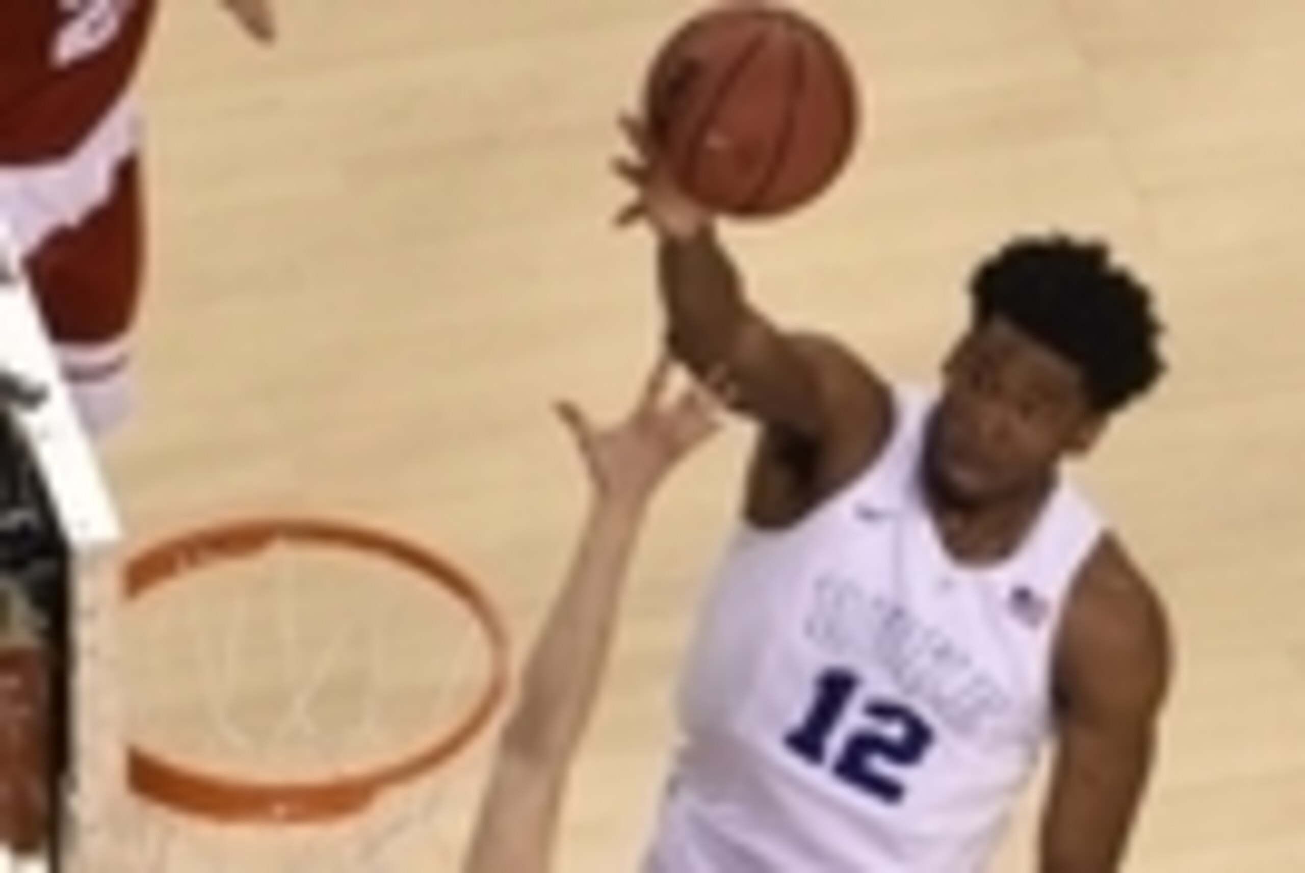 Apr 6, 2015; Indianapolis, IN, USA; Duke Blue Devils forward Justise Winslow (12) shoots the ball against Wisconsin Badgers guard Bronson Koenig (24) during the second half in the 2015 NCAA Men's Division I Championship game at Lucas Oil Stadium. Mandator