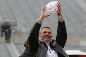 Jan 24, 2015; Columbus, OH, USA; Ohio State Buckeyes head coach Urban Meyer with the Coaches Trophy during the national championship celebration at Ohio Stadium. Mandatory Credit: Joe Maiorana-USA TODAY Sports