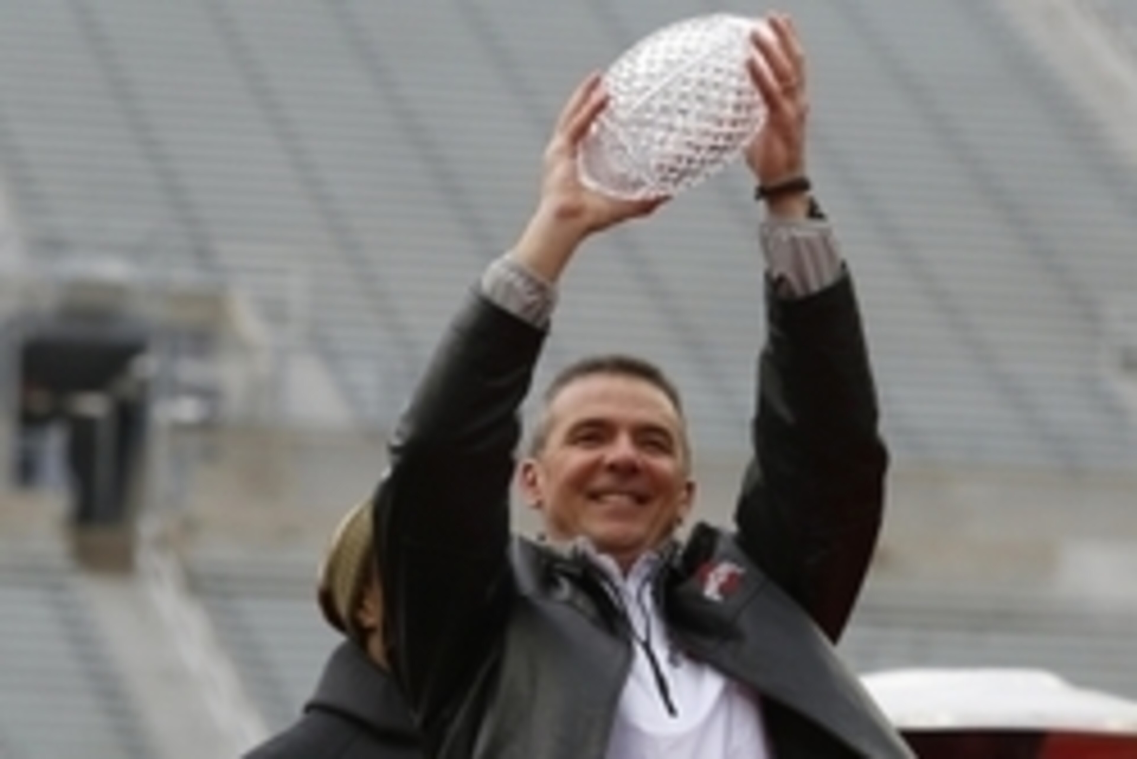 Jan 24, 2015; Columbus, OH, USA; Ohio State Buckeyes head coach Urban Meyer with the Coaches Trophy during the national championship celebration at Ohio Stadium. Mandatory Credit: Joe Maiorana-USA TODAY Sports