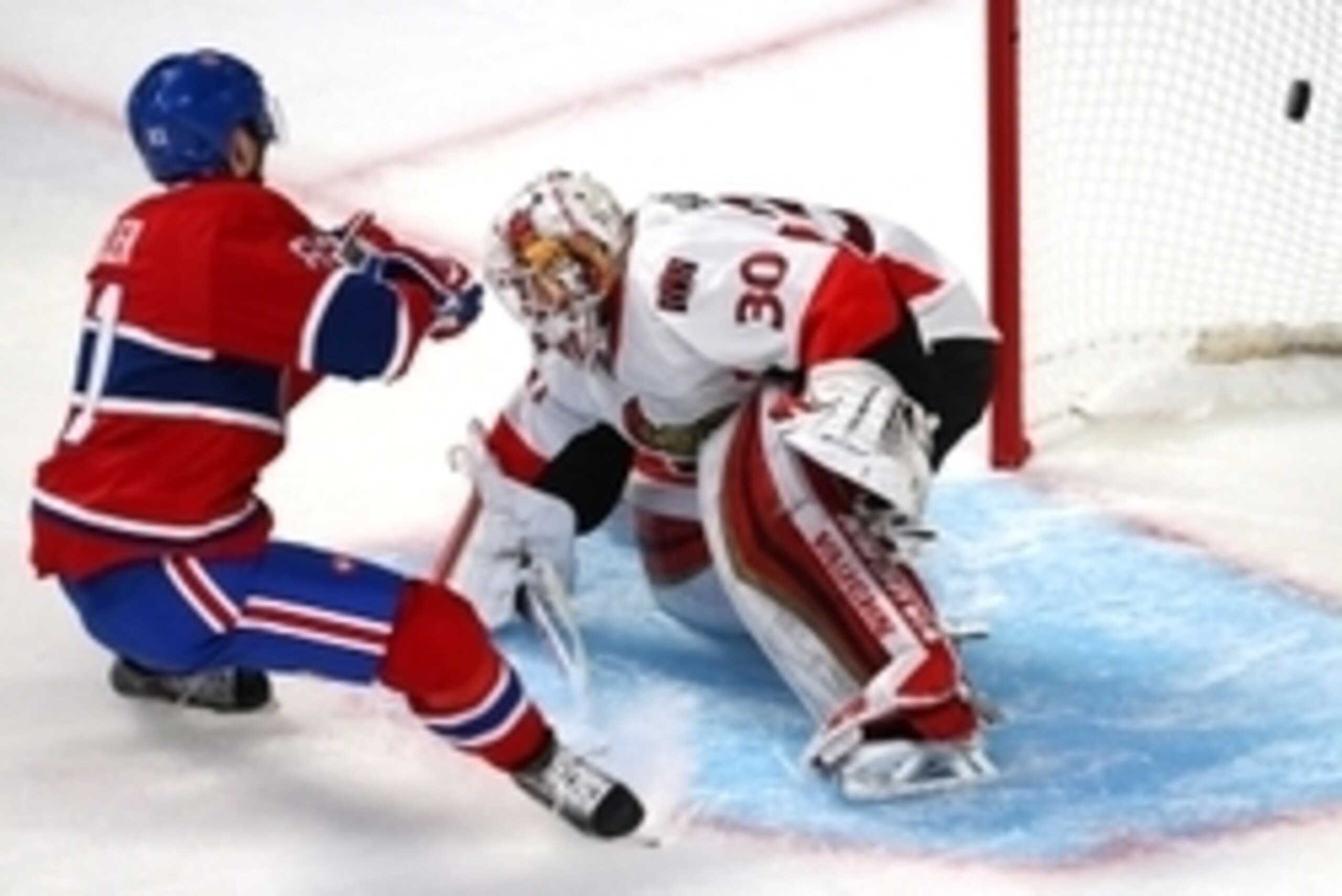 Apr 15, 2015; Montreal, Quebec, CAN; Montreal Canadiens center Lars Eller (81) scores a goal against Ottawa Senators goalie Andrew Hammond (30) during the second period in the game one of the first round of the 2015 Stanley Cup Playoffs at Bell Centre. Ma
